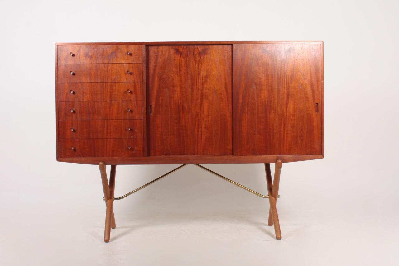 Sideboard in teak and oak, designed by Hans Wegner and made by Carl Hansen Cabinetmakers. Great original condition.