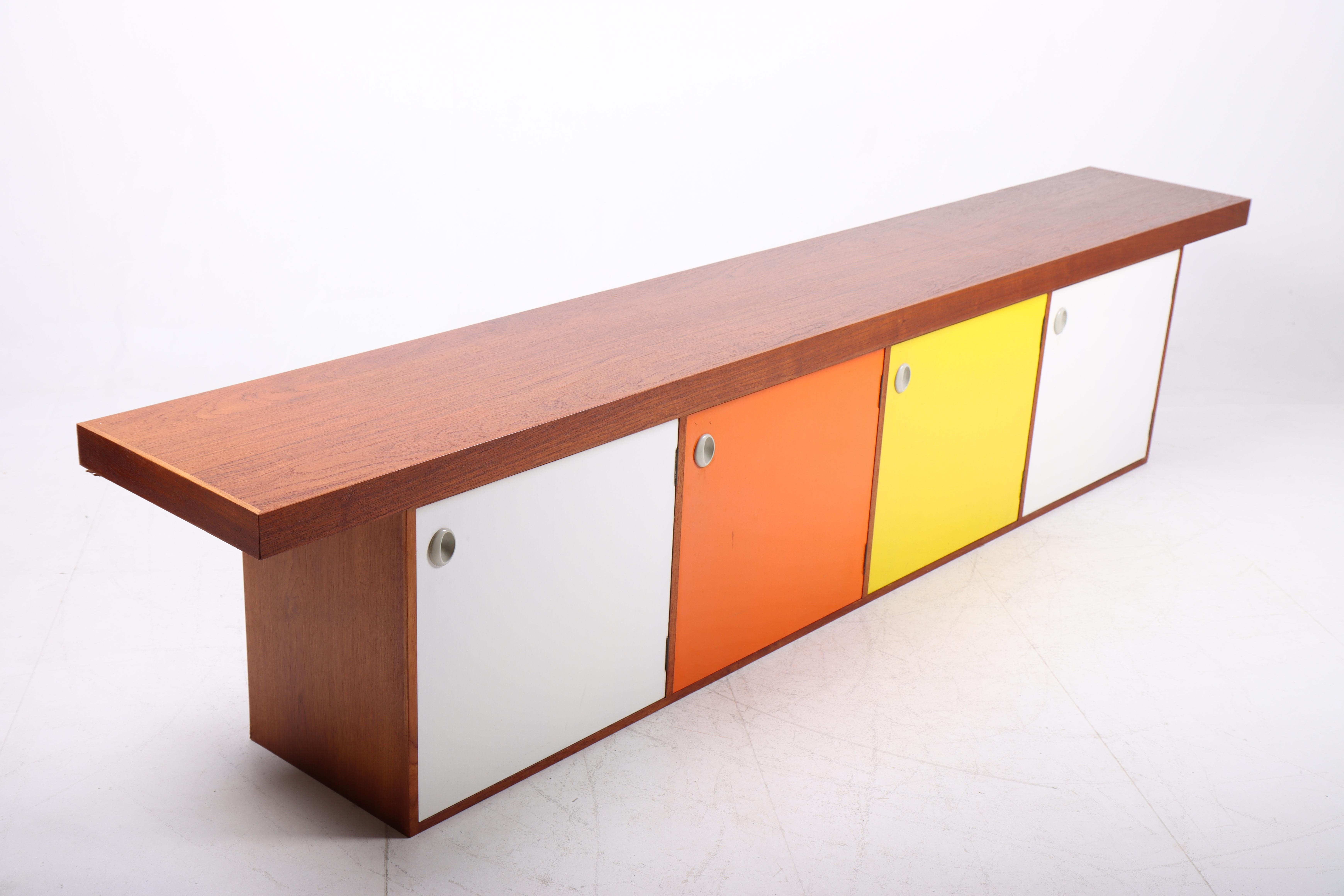 Rare Midcentury Wall-Mounted Sideboard in Teak with Colored Panels 1