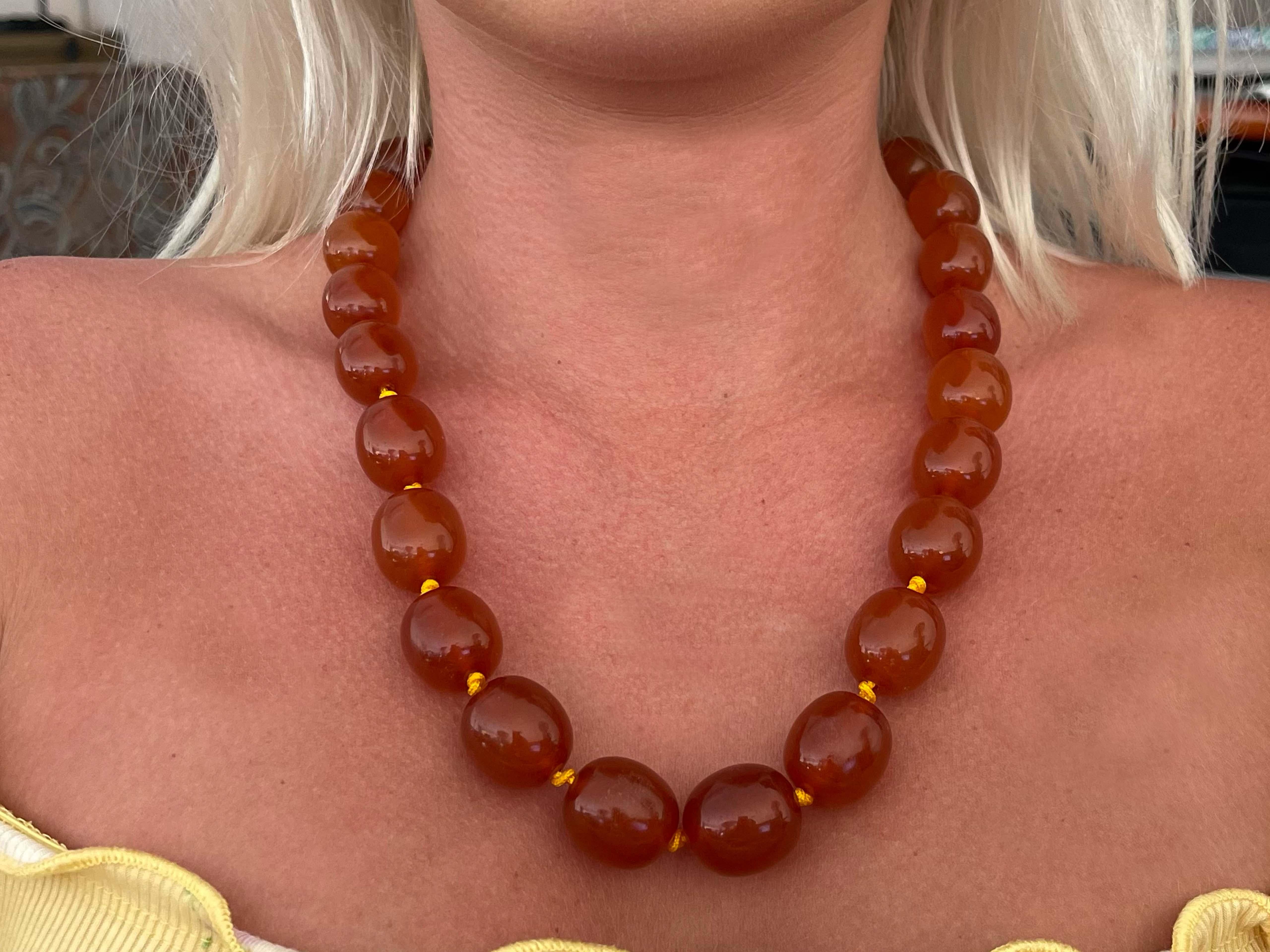 Specifications:

Designer: Ming's

Metal: 14k Yellow Gold

Gemstones: Amber

Total Weight: 94.8 Grams

Necklace Length: 23