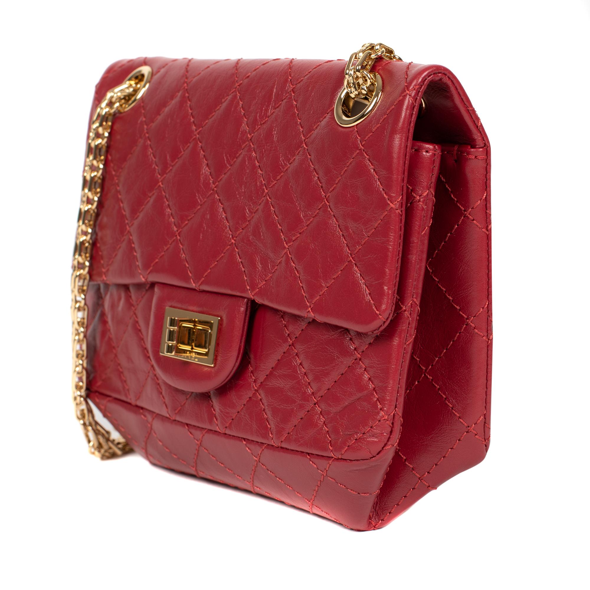 Women's Rare Mini Chanel 2.55 Reissue handbag in red quilted leather, gold hardware