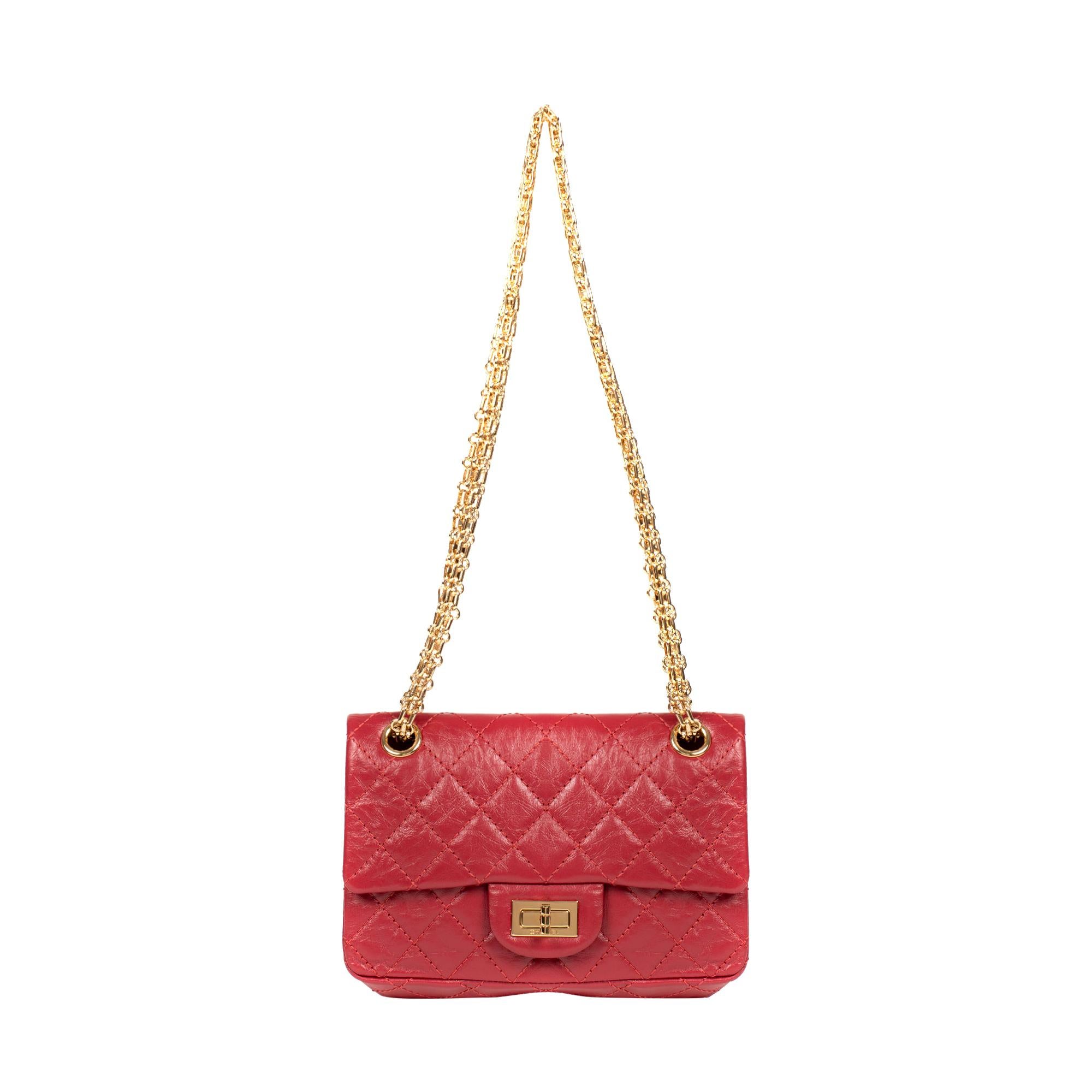 Rare Mini Chanel 2.55 Reissue handbag in red quilted leather, gold hardware