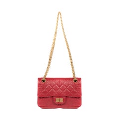 Rare Mini Chanel 2.55 Reissue handbag in red quilted leather, gold hardware