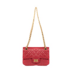 Rare Mini Chanel 2.55 Reissue handbag in red quilted leather, gold hardware