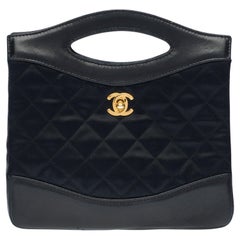 Rare Mini Chanel 31 Tote bag in black quilted satin and black leather, GHW