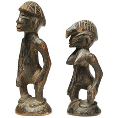 Rare paire miniature de figures masculines et féminines de divination Senufo:: très usées