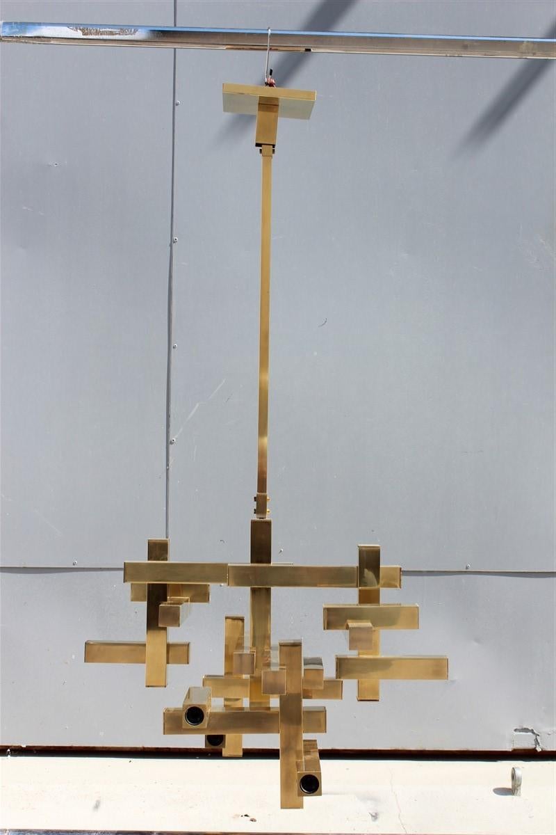 Rare minimal sculptural gold brass Sciolari chandelier Italian design, 1970s.
 10 light bulb E14 Max 40 Watt.