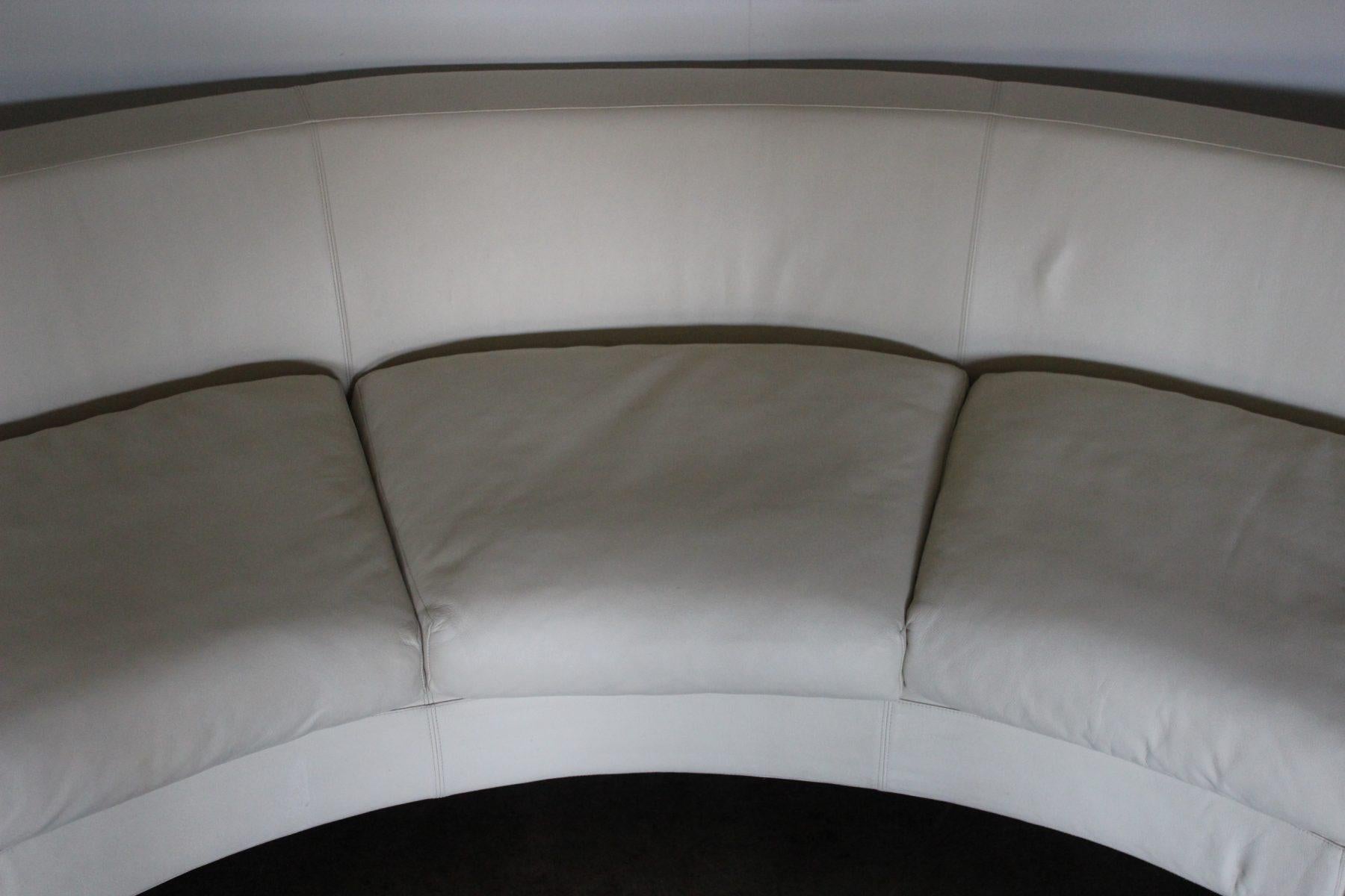 curved cream sofa