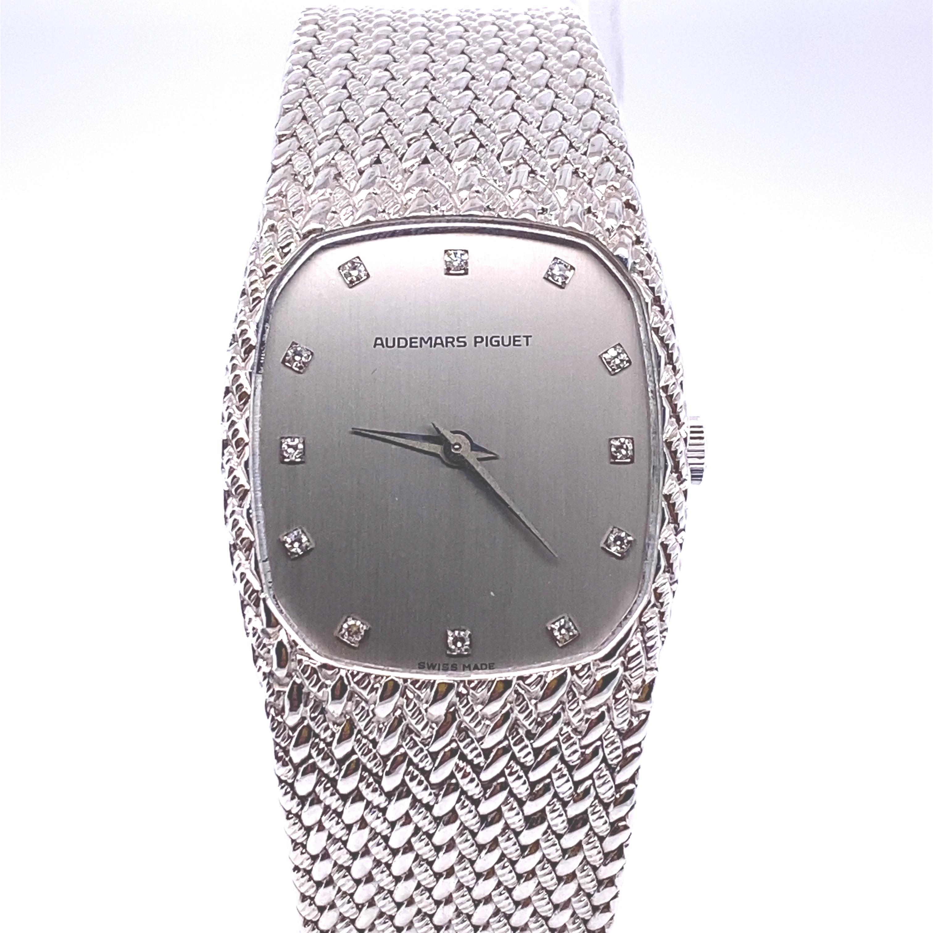 Rare, Mint, Audemars Piguet Vintage 27mm 18K White Gold Oman Bracelet Watch
This Audemars Piguet Vintage 27mm 18K White Gold Bracelet Watch features an 18K White Gold case measuring 27mm in diameter. 7 1/2 inches in length, (19mm). Fits a size