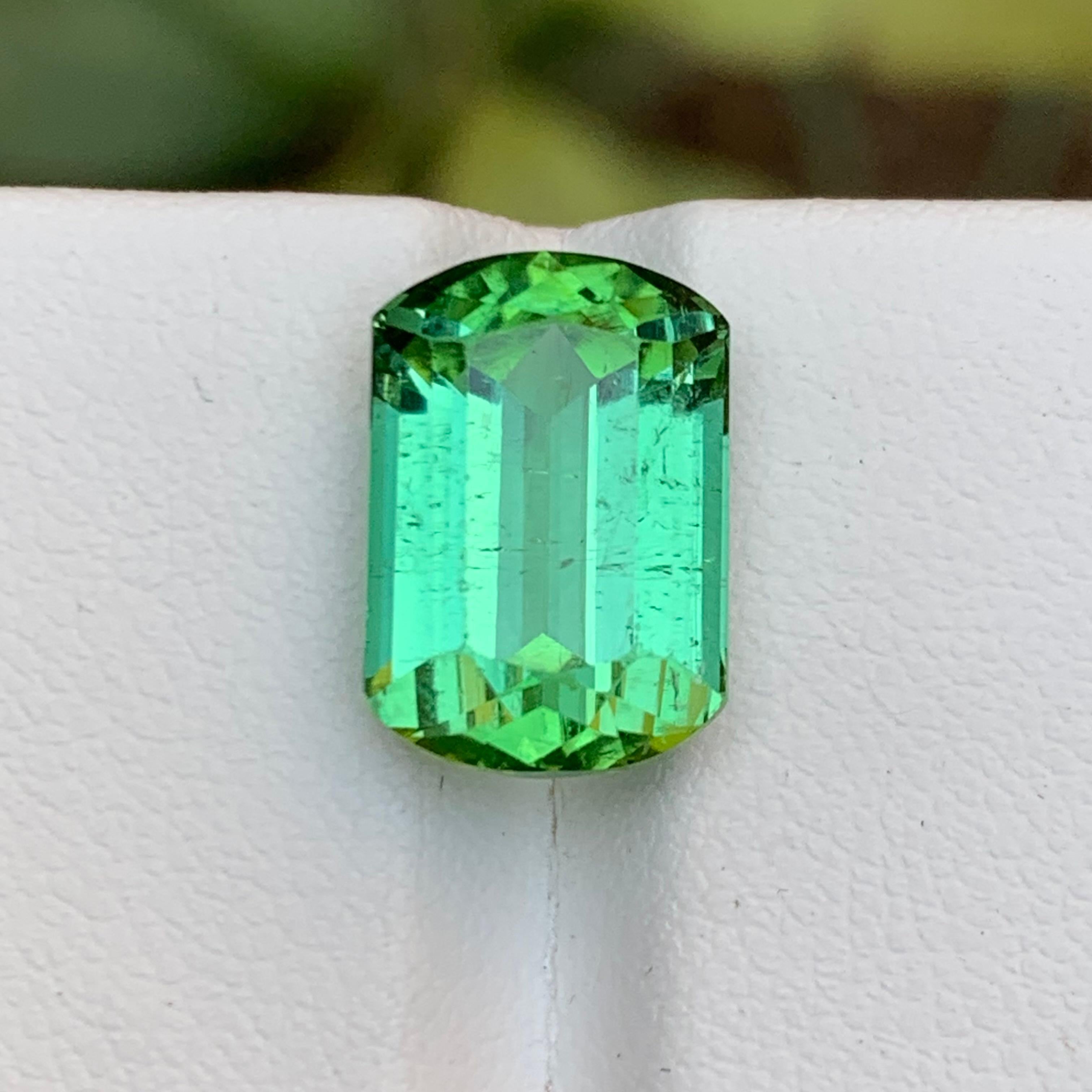 GEMSTONE TYPE: Tourmaline
PIECE(S): 1
WEIGHT: 7.95 Carats
SHAPE: Emerald Cut Modified Cushion Corners
SIZE (MM):  13.70 x 9.34 x 7.42
COLOR: Mint Green
CLARITY: Slightly Included 
TREATMENT: None
ORIGIN: Afghanistan 🇦🇫 
CERTIFICATE: On
