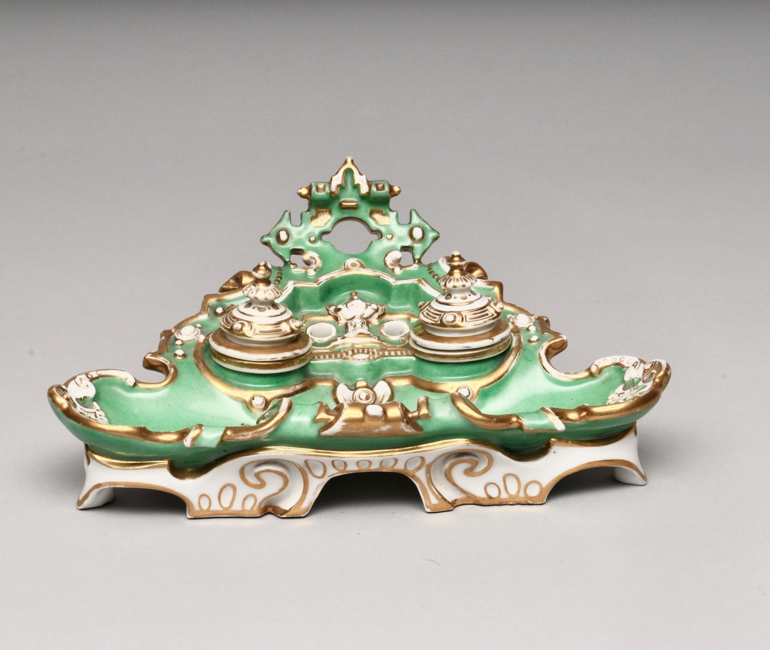 Minton Double Inkwell

Measures: H 10cm, W 25cm, D 18cm

A beautiful inkwell, in excellent condition and stunning color.