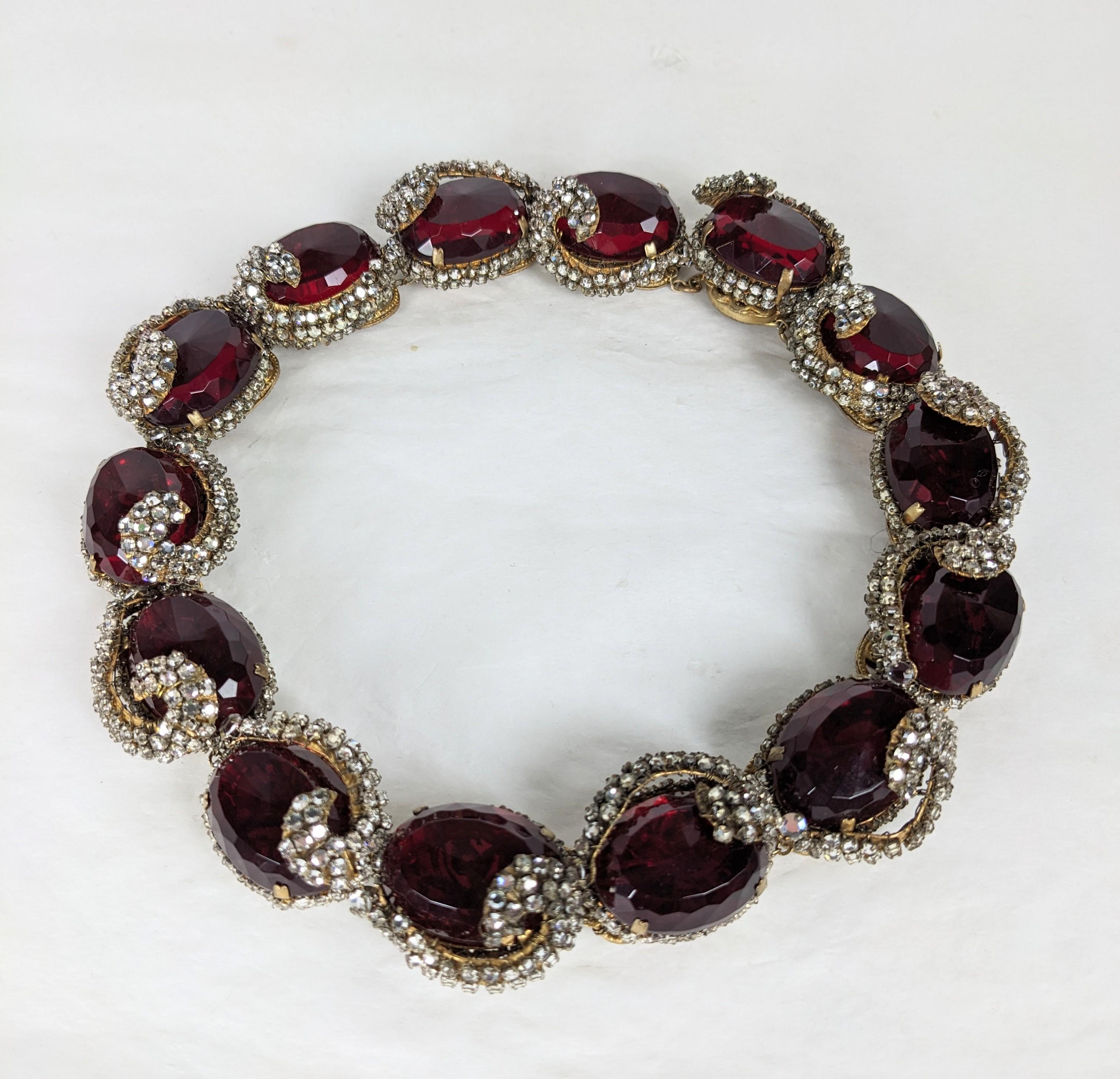 Rare and Special Collector Quality Miriam Haskell Ruby Collar with Elaborate Rose Montee Crystal Swirl Decoration from the 1940's. Extraordinary craftsmanship, hand sewn with hundreds of rose montee crystals onto signature Russian gilt filigrees.