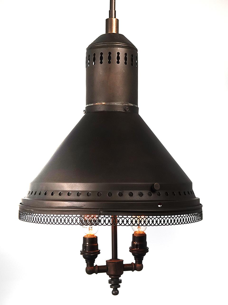 We love these mirrored reflector lamps and they are also a favorite of collectors. This example has a 12 inch diameter with 24 separate hand cut mirrors and a filigree bottom edge. It may have once been a gas or oil lamp but is now wired for 2 E12