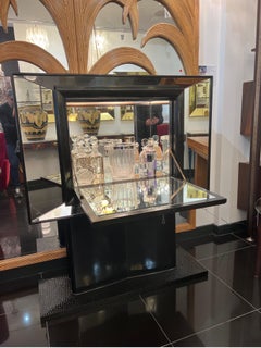 Rare mirrored with black lacquer bar cabinet by Vittorio Valabrega
