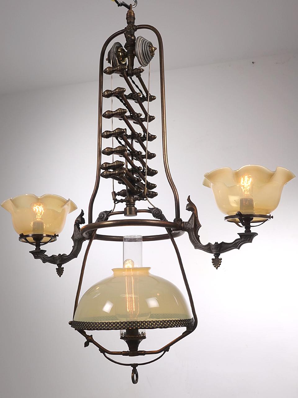 We've been doing this for some time and have never been able to find one of these Mitchell Vance Gasoliers. To say they are rare is an understatement. But for most rare is less important than it's amazing look. This long scissor design was very