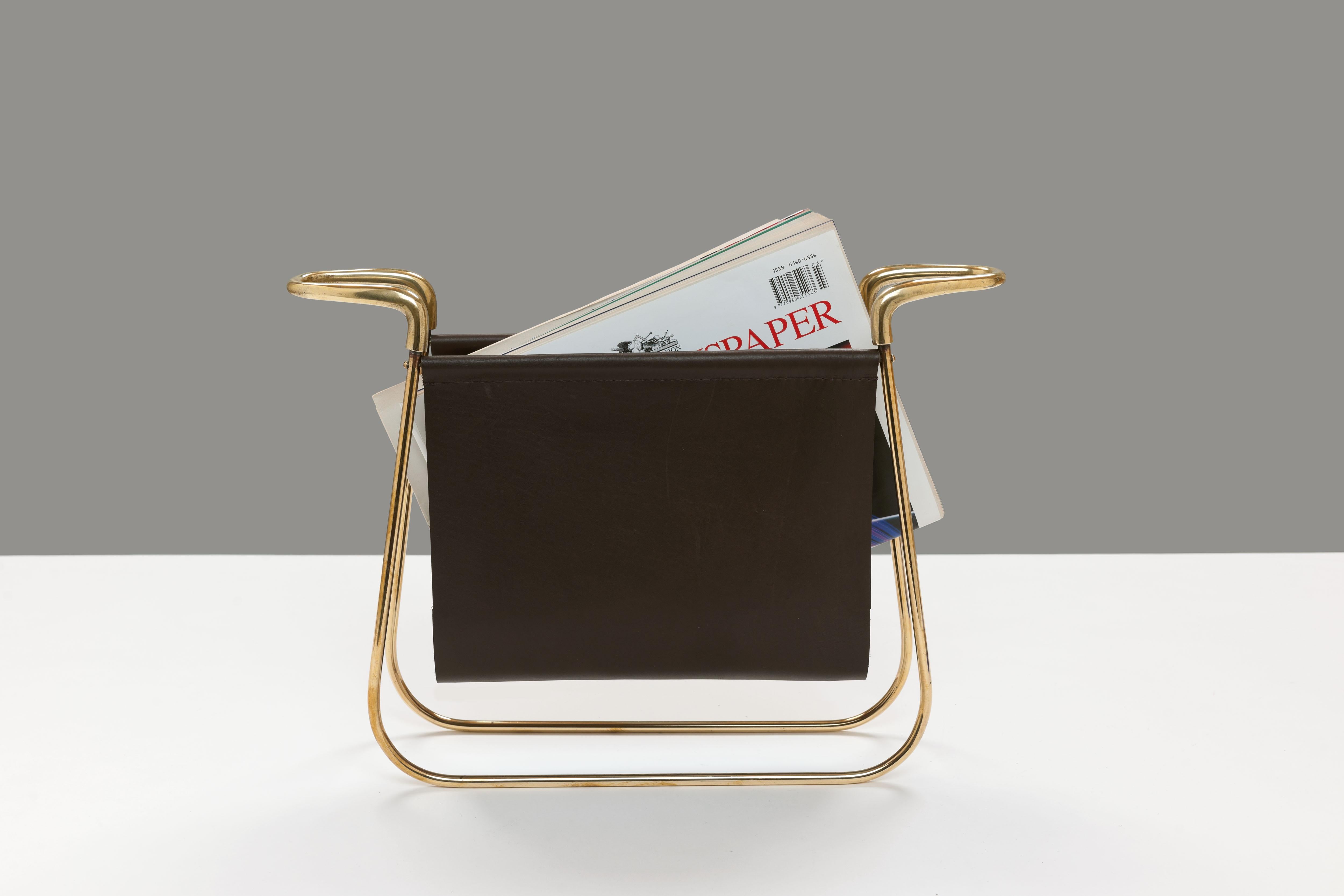 Solid brass and dark brown saddle leather magazine holder by Carl Aubock, Vienna from early 1960. 
Rare model 3608 magazine stand in solid brass & leather hand crafted at the renown and important Carl Aubock Workshop, Austria.  

A very rare model