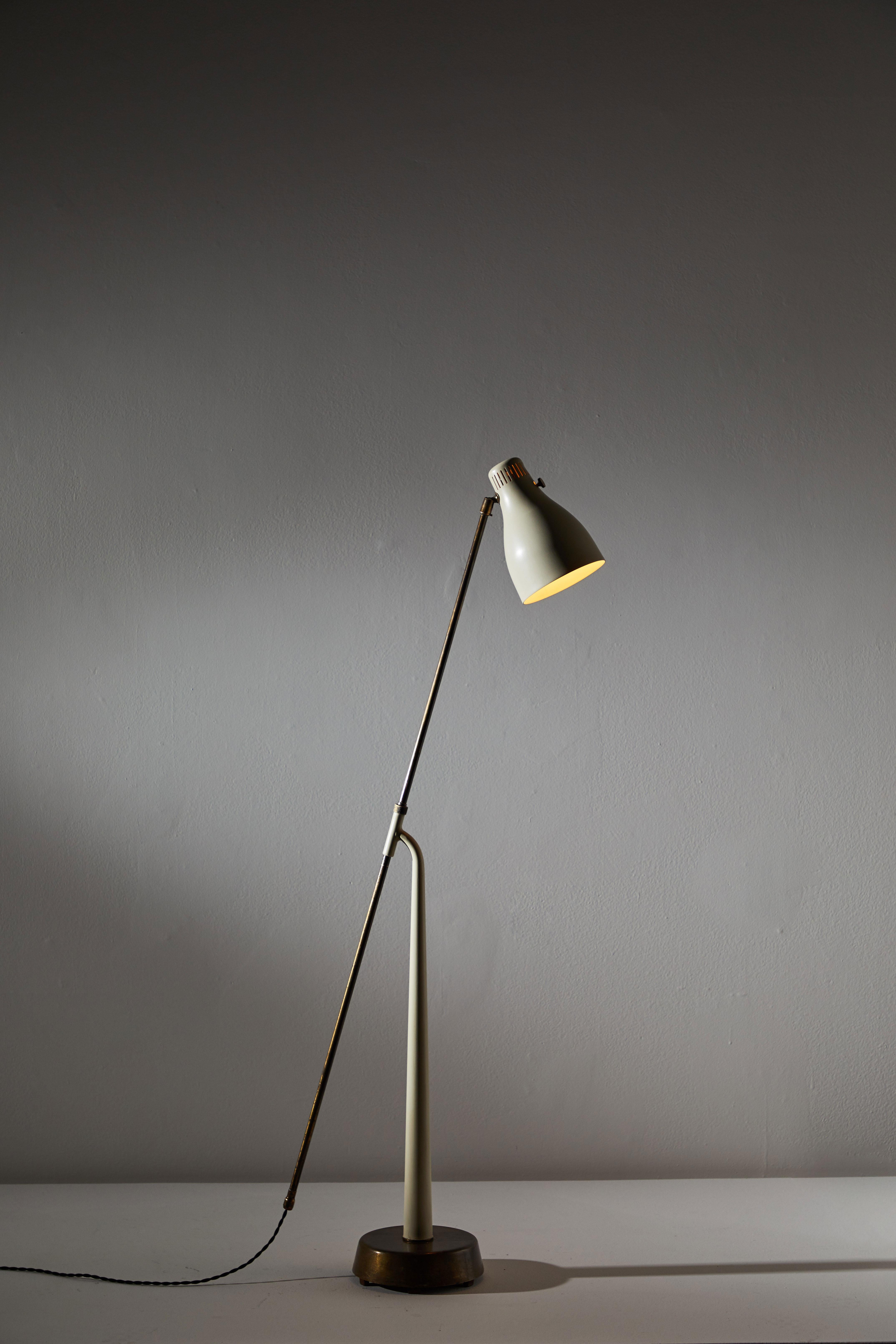 Model 541 floor lamp by Hans Bergstrom for Atelje Lyktan. Designed and manufactured in Sweden, 1945. Rare metal enameled shade version. Brass hardware. Arm and shade are adjustable. Rewired with black French twist cord. Takes one E27 75w maximum