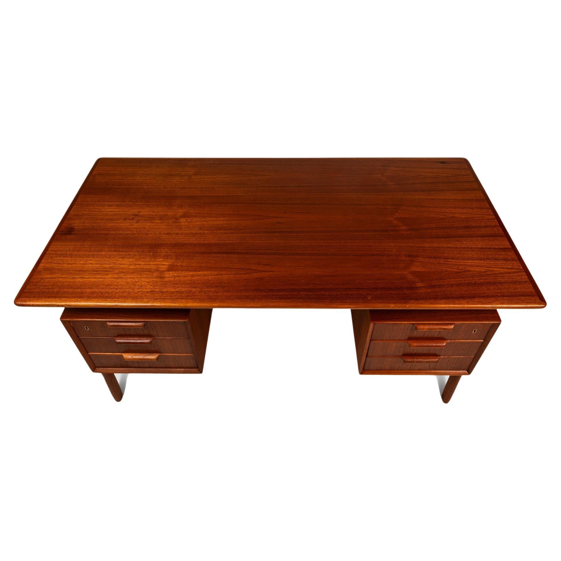 Rara scrivania in teak Model 75, Gunni Omann, Omann Jun Møbelfabrik, Danimarca, 1960 ca.