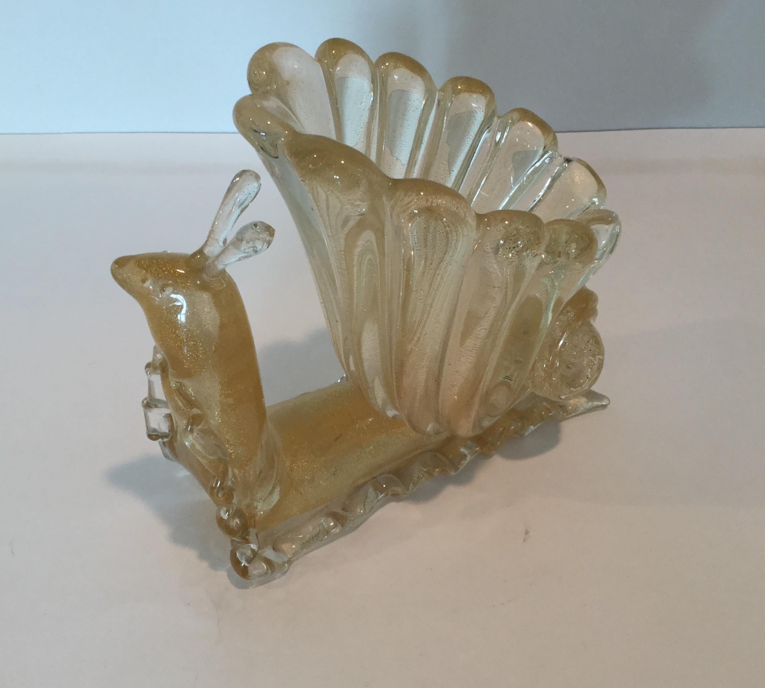 Very rare, seldom seen model 8554 Seguso Vetri D'Arte shell and snail sculpture. Do not miss your chance to own this piece. Pictures of piece in catalog with model number are attached.
