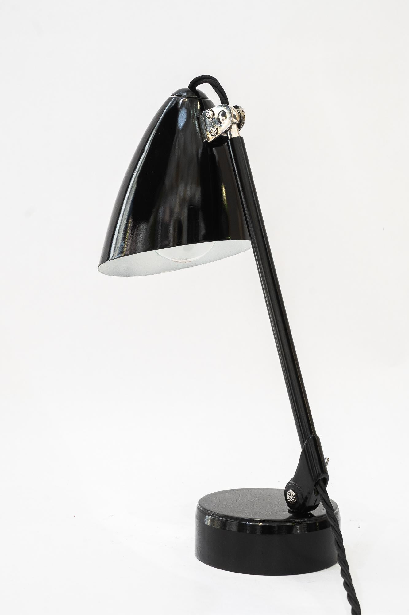 Metal Rare model of a Swiveling Art Deco table lamp vienna around 1920s For Sale