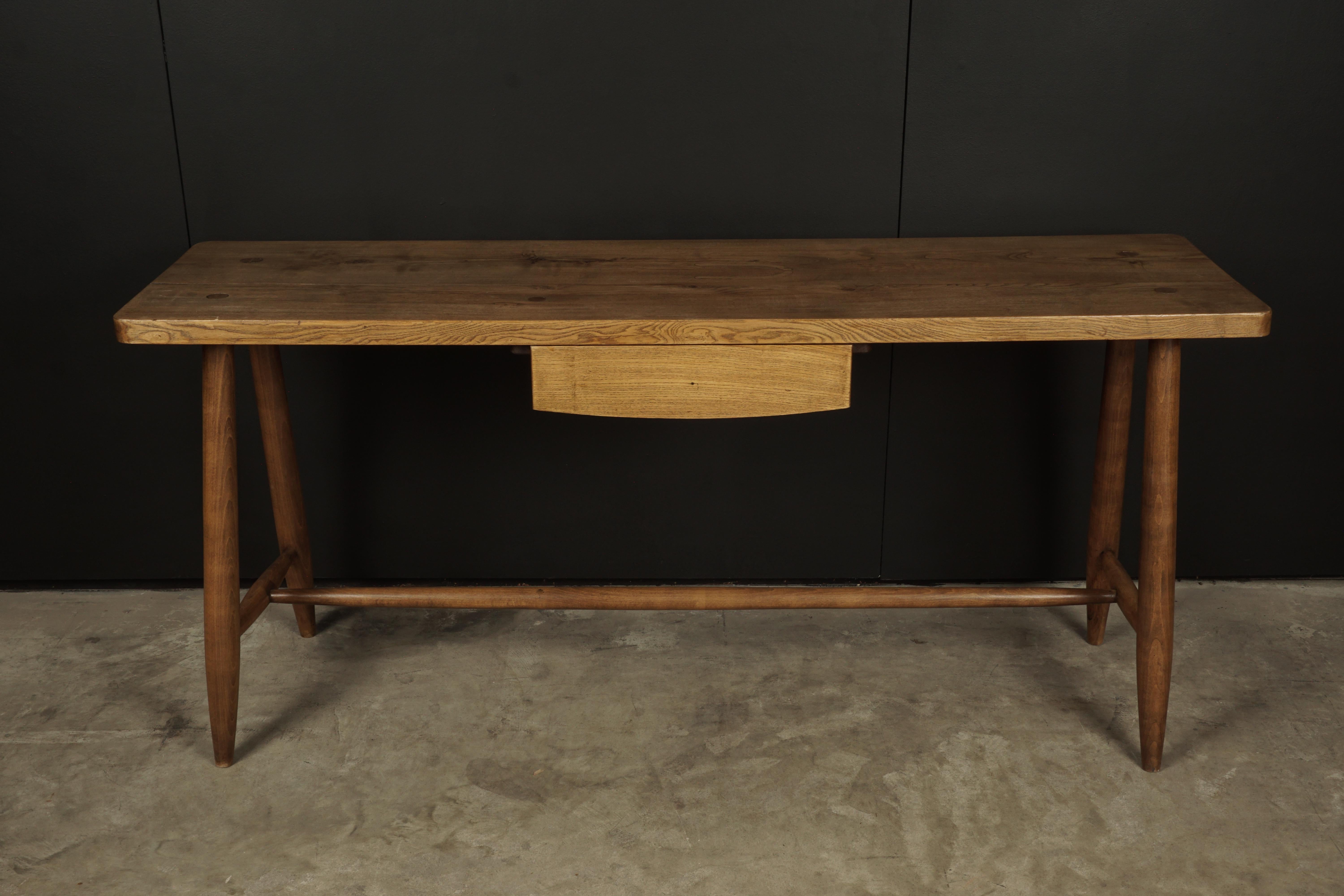 Rare modern console in oak from France, 1960s. Solid oak construction with light patina and wear.