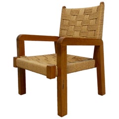 Vintage Rare Modernist Bold Oakwood Lounge Chair and Handcrafted Raffia Woven Seating