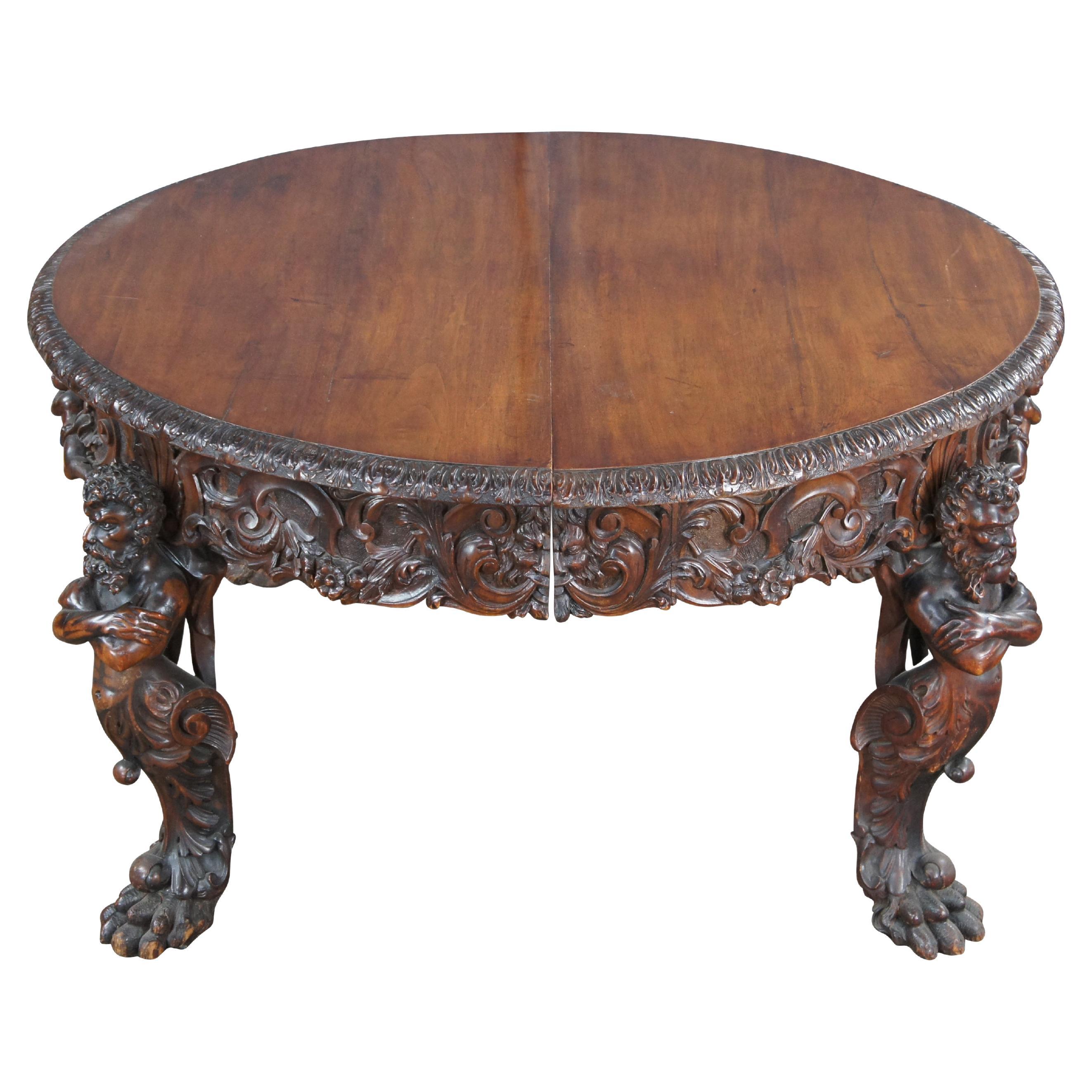 Rarissime table de salle à manger en acajou figuré de style Renaissance italienne, vers les années 1850-1870. La table peut être utilisée dans sa forme arrondie plus petite de 59 pouces ou allongée jusqu'à 125 pouces avec trois feuilles pour une