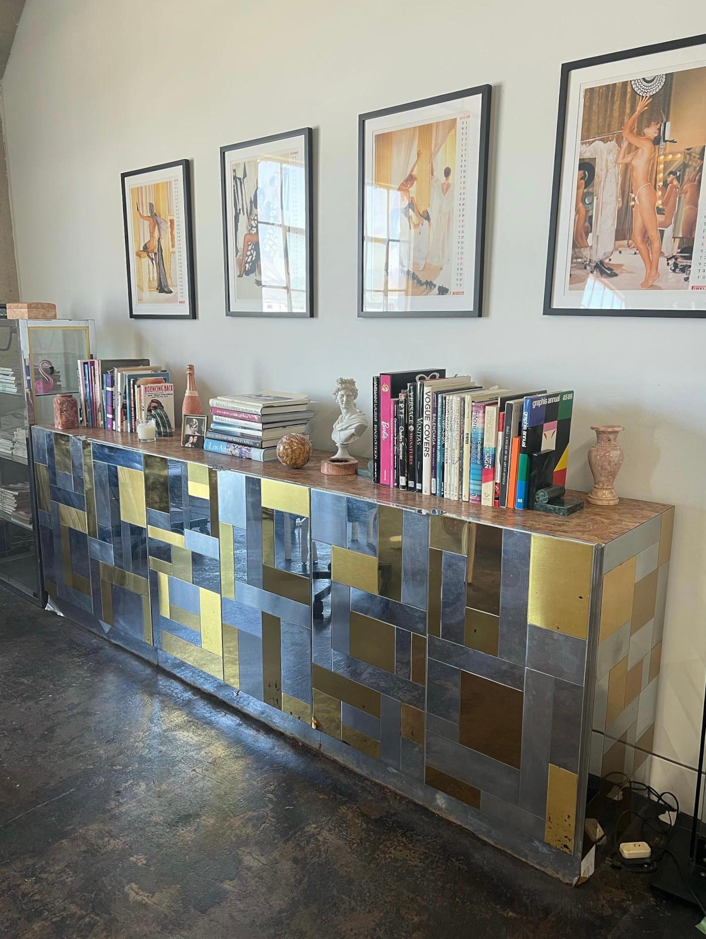 An incredibly rare credenza attributed to Paul Evans from his “Cityscape” series, late 20th century. Featuring patchwork strips of mixed metals and a burlwood top, this piece fuses elements of 1970s craftsman elements with cutting edge postmodern