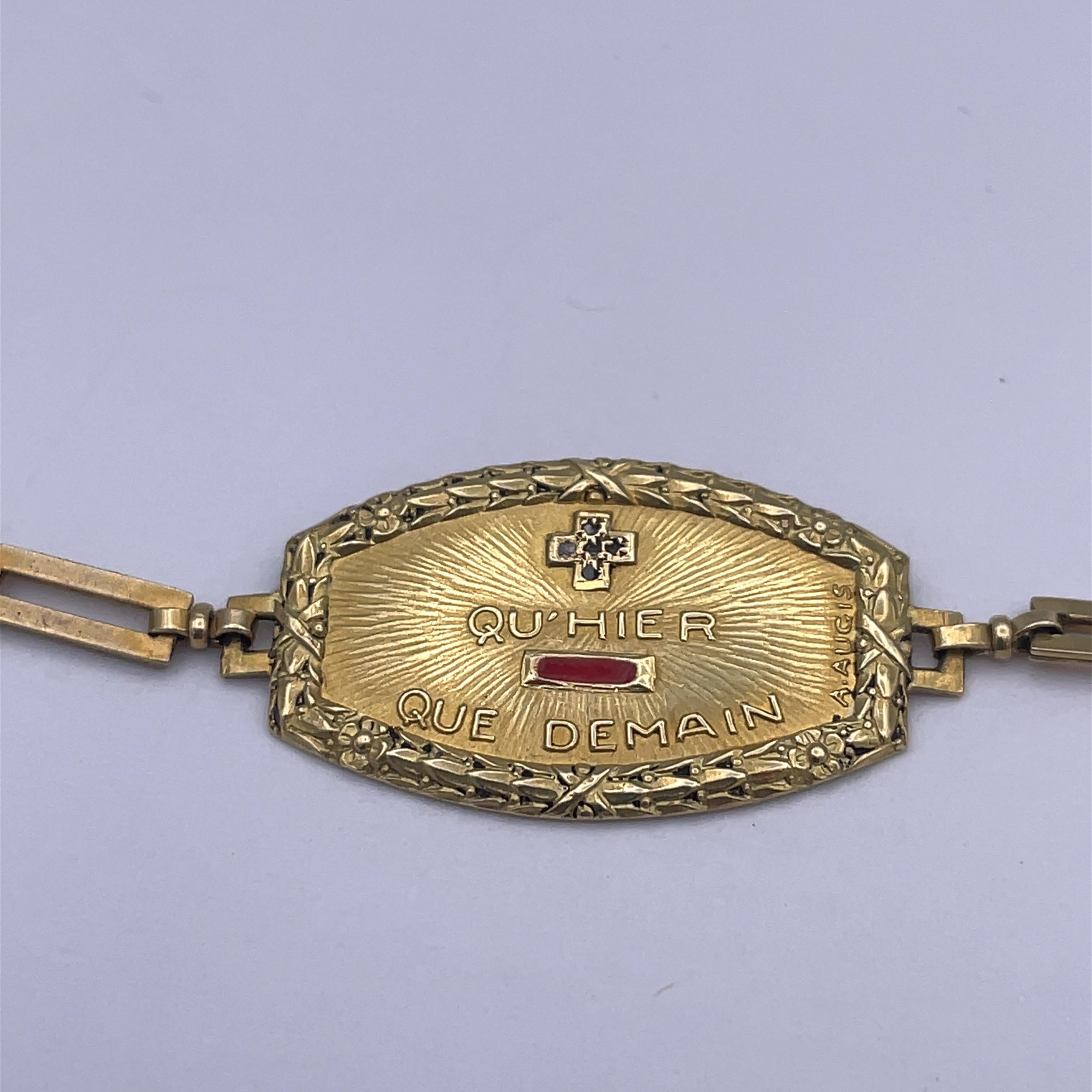 Exceedingly rare antique bracelet: The center cartouche is set with an applied + (plus) sign,  set with rose diamonds, and an applied - (minus) sign, with red enamel.
Applied laurel leaf border.  On a fine open link 7