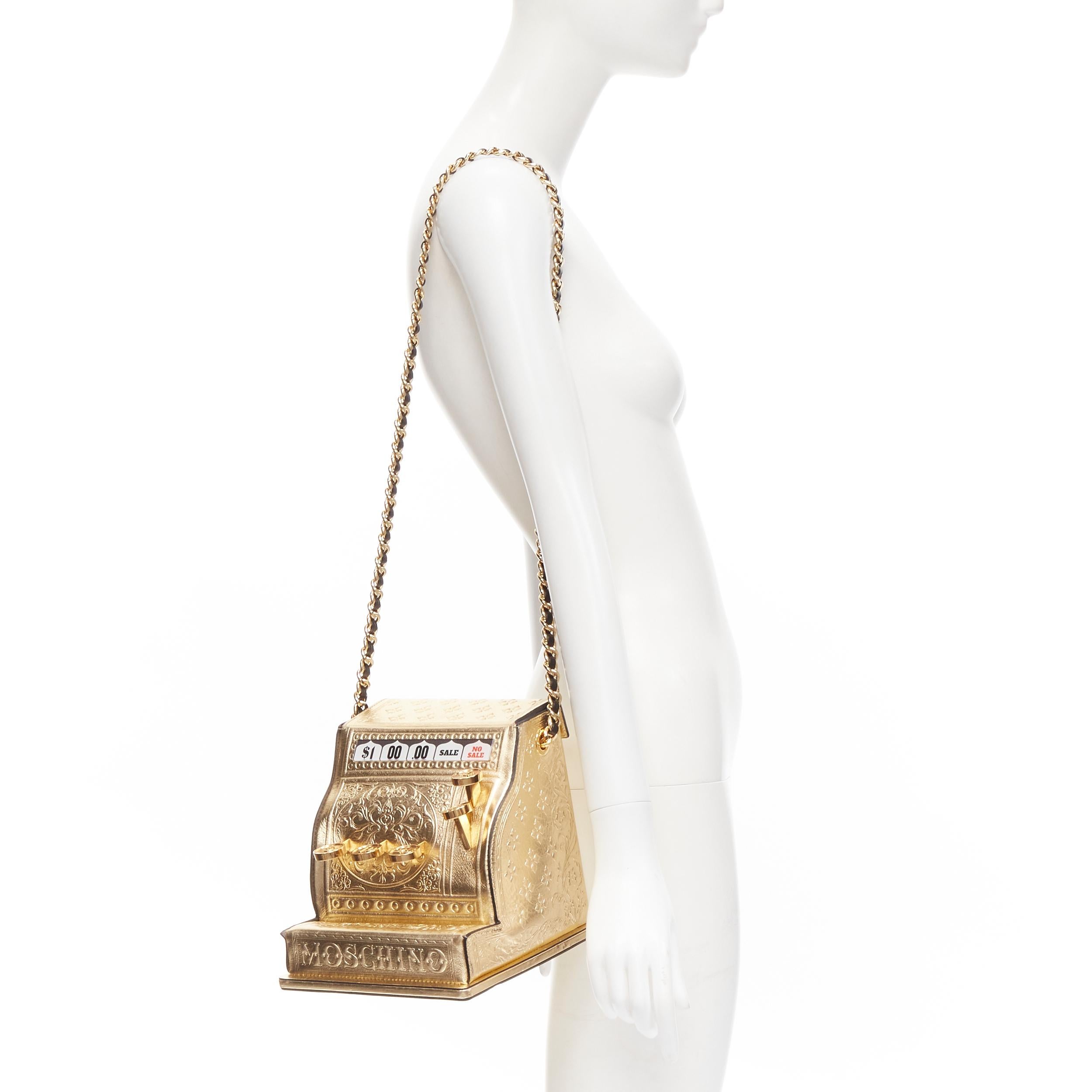 rare MOSCHINO Couture! 2019 Runway gold Cash Register Machine crossbody bag 
Reference: TGAS/B02126 
Brand: Moschino 
Designer: Jeremy Scott 
Collection: Fall Winter 2019 
Runway Material: Leather 
Color: Gold 
Pattern: Solid 
Closure: Magnetic