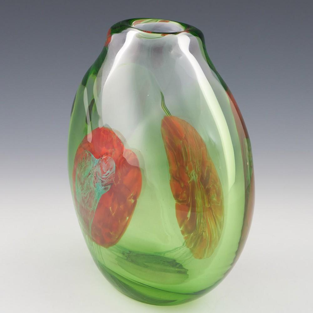 Rare Moser Cased Ovoid Vase Designed Jiri Suhajek, 1976

Additional information:
Date : Designed 1976
Origin : Karslbad, Czechoslovakia
Bowl Features : Ovoid form with cased clear and green glass, abstract design with red and green glass on seperate