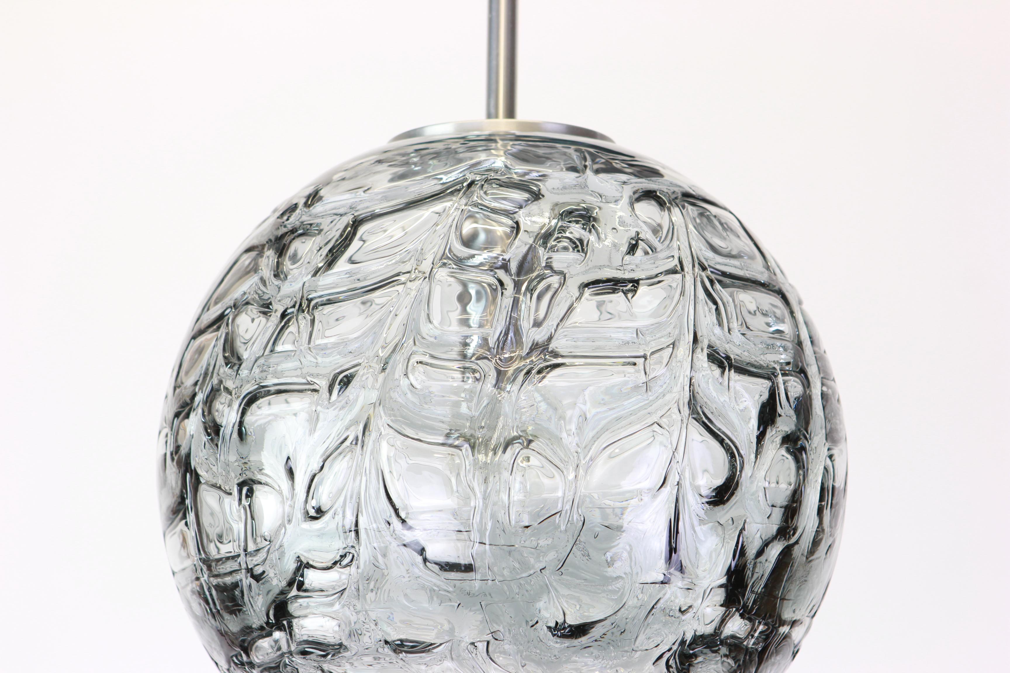 Doria ceiling light with large volcanic Murano glass ball.
A high quality of materials, gives a wonderful light effect when it is on.

Cleaned, well-wired and ready to use. The fixture requires one E27 Standard bulb with 100W max and compatible