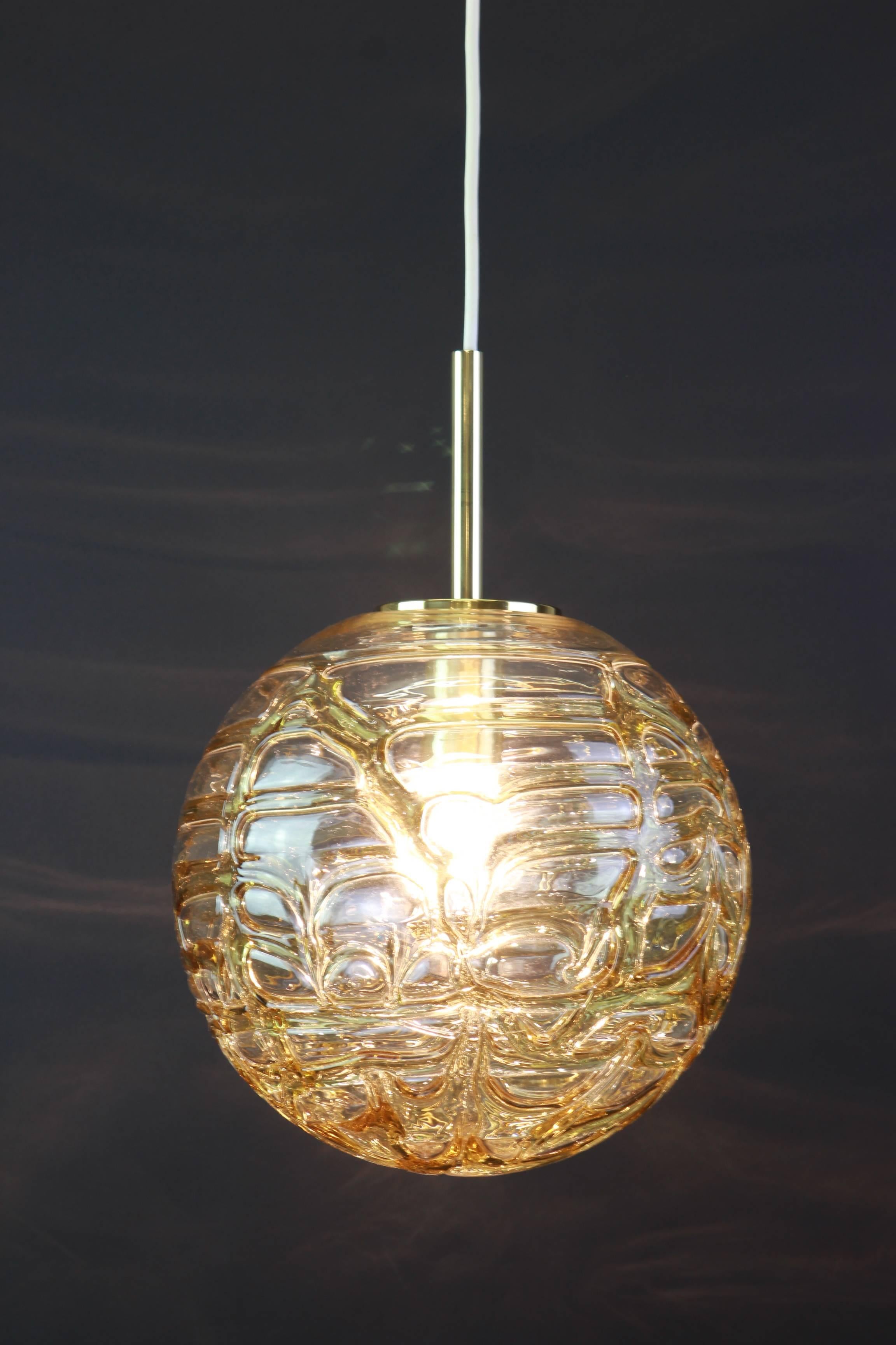 Doria ceiling light with large volcanic Murano glass ball.
High quality of materials, gives a wonderful light effect when it is on.

High quality and in very good condition. Cleaned, well-wired and ready to use. 

The fixture requires one