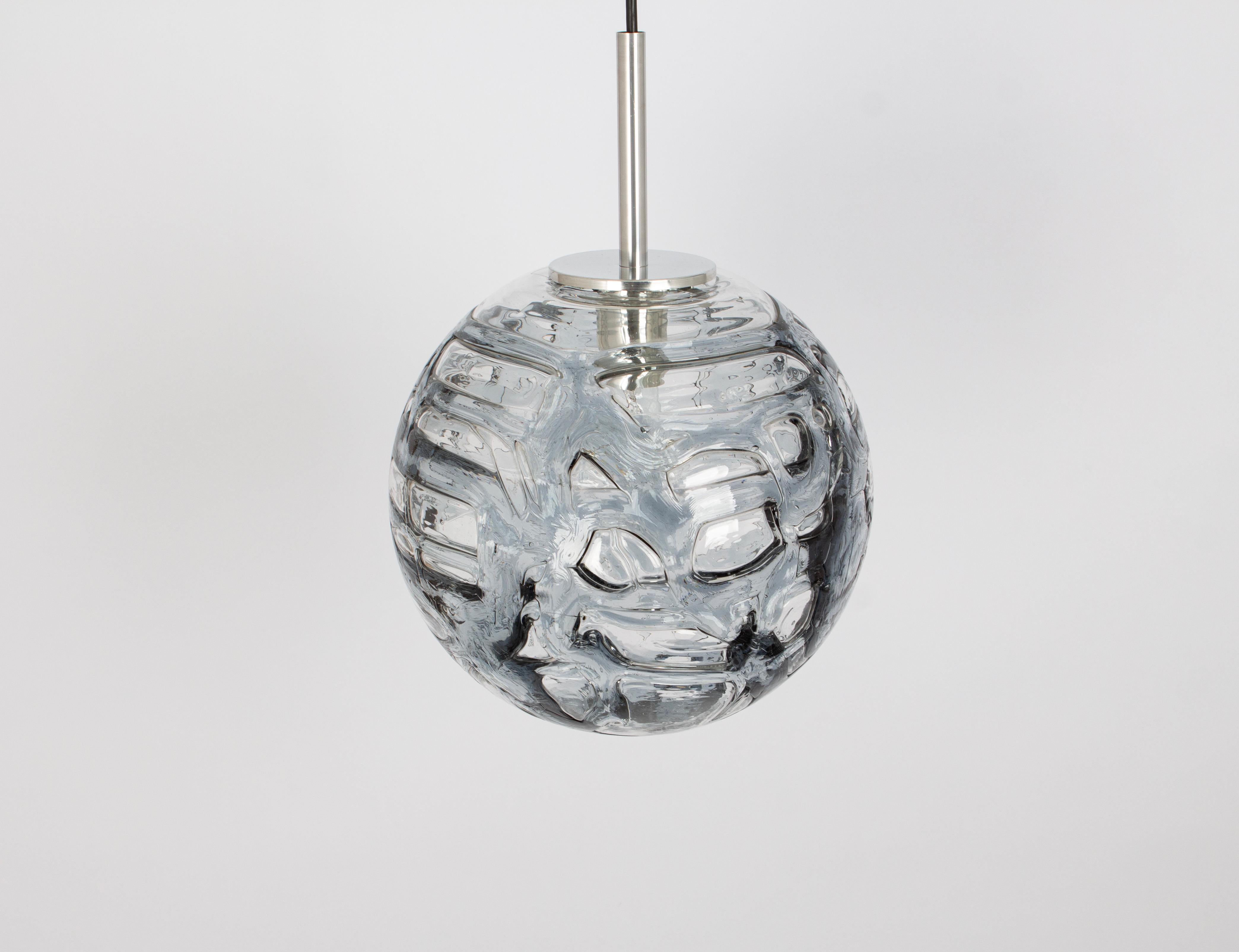 Doria ceiling light with large volcanic Murano glass ball.
High quality of materials, gives a wonderful light effect when it is on.

Sockets: One E27 standard bulbs. Max 100 Watts.
Light bulbs are not included. It is possible to install this fixture