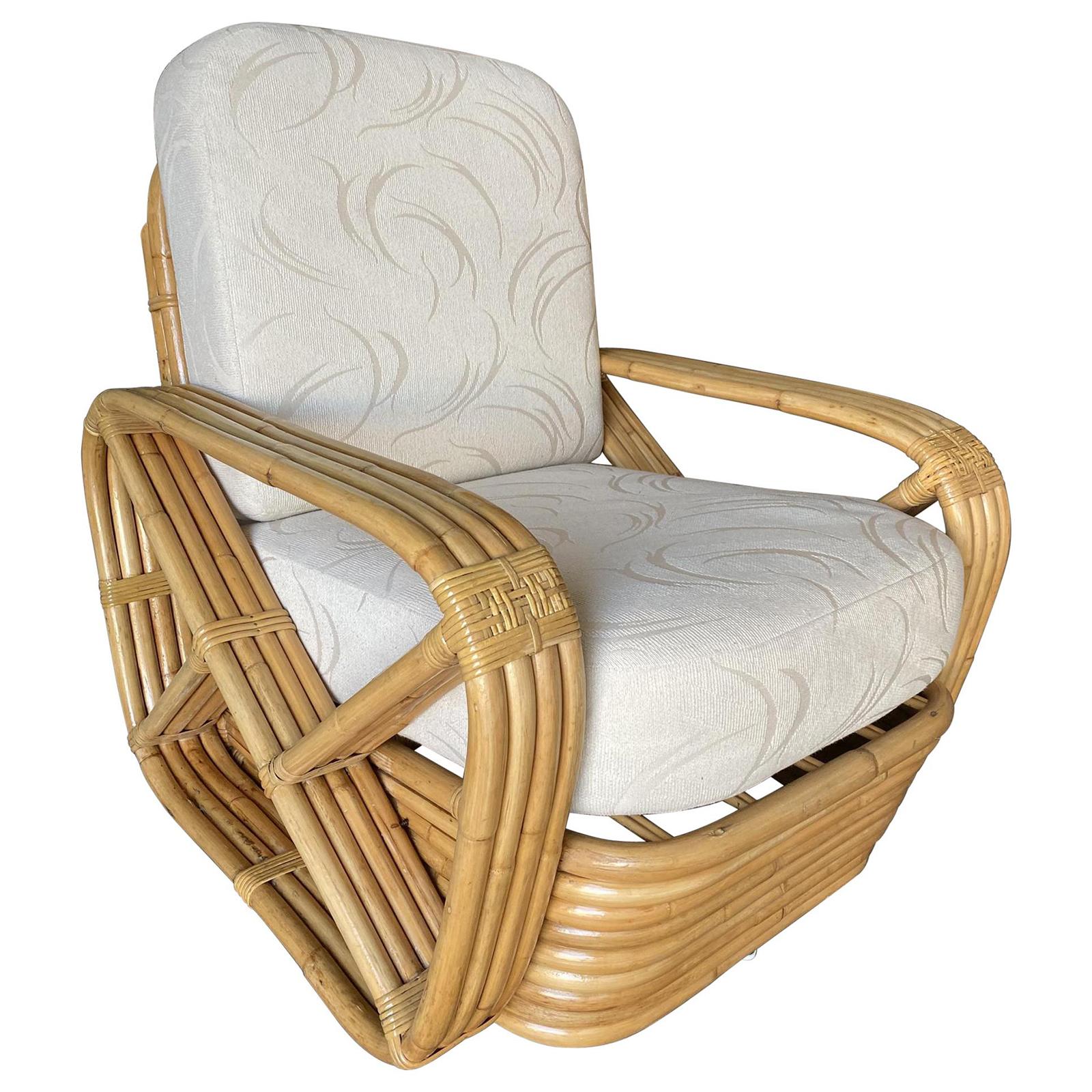 Paul Frankl four-strand square pretzel rattan arm lounge chair. This chair dates from 1934. This chair is a Paul Frankl original. This comes directly from a Paul Frankl-decorated house located in Los Angeles and is documented.

Custom cushions
