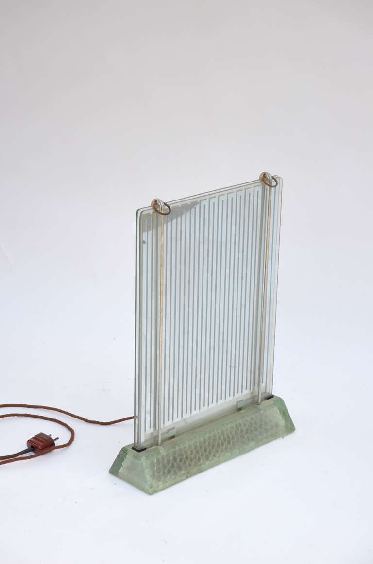 Glass radiator, model Radiaver designed by Rene Coulon (French architect) for Saint Gobain. Designed in 1937 and fabricated till 1952. Made for the industrial exposition in 1937 EDF Electropolis. Double glass plates and illuminated feet. 110 Volts /