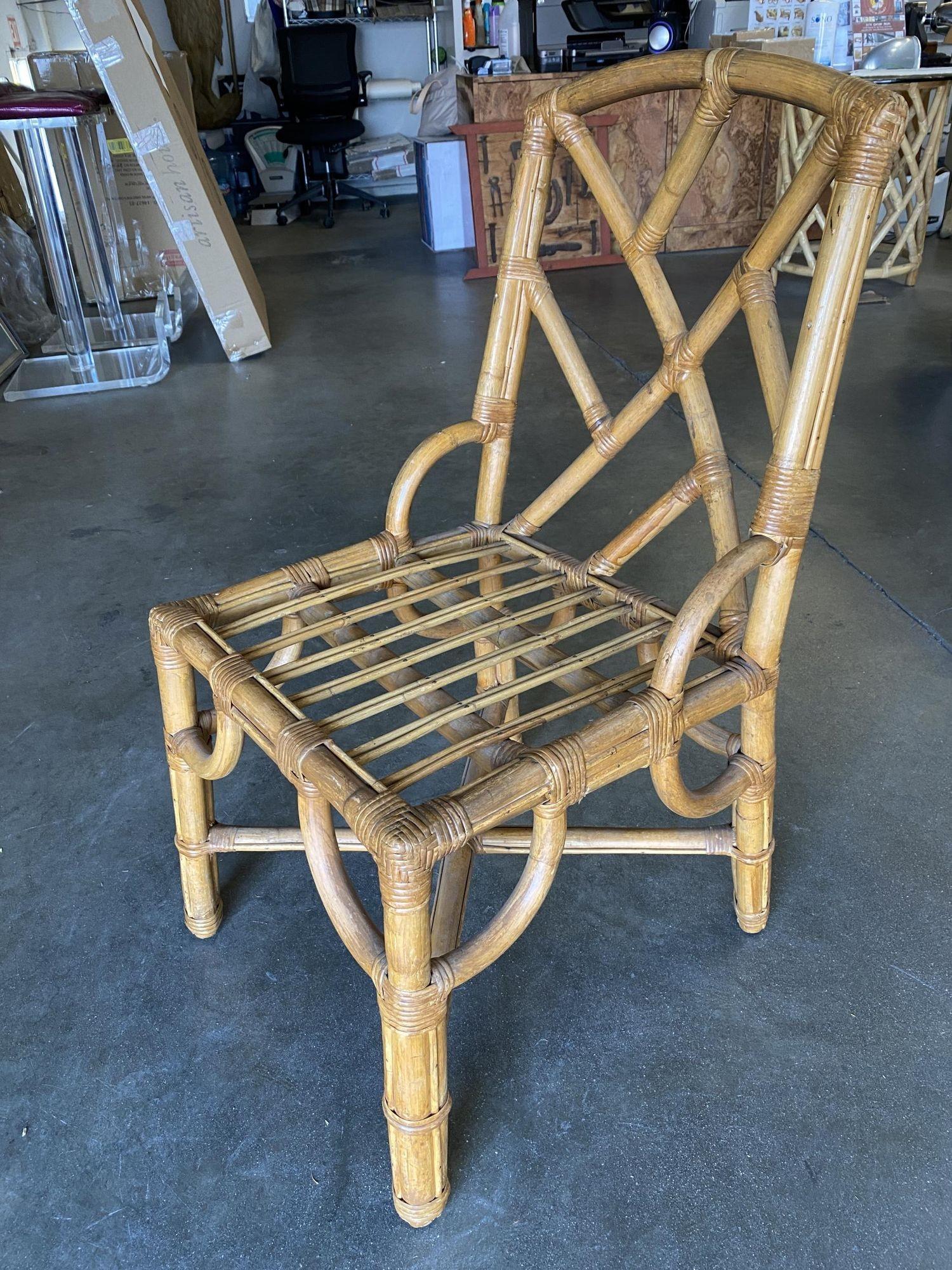 Vintage midcentury slat leg rattan dining room chair with geometric back by designer Paul Frankl, included is a set of 4 side chairs and 2 matching armchairs. The side chairs feature a slanted slat design with the armchairs having the same geometric