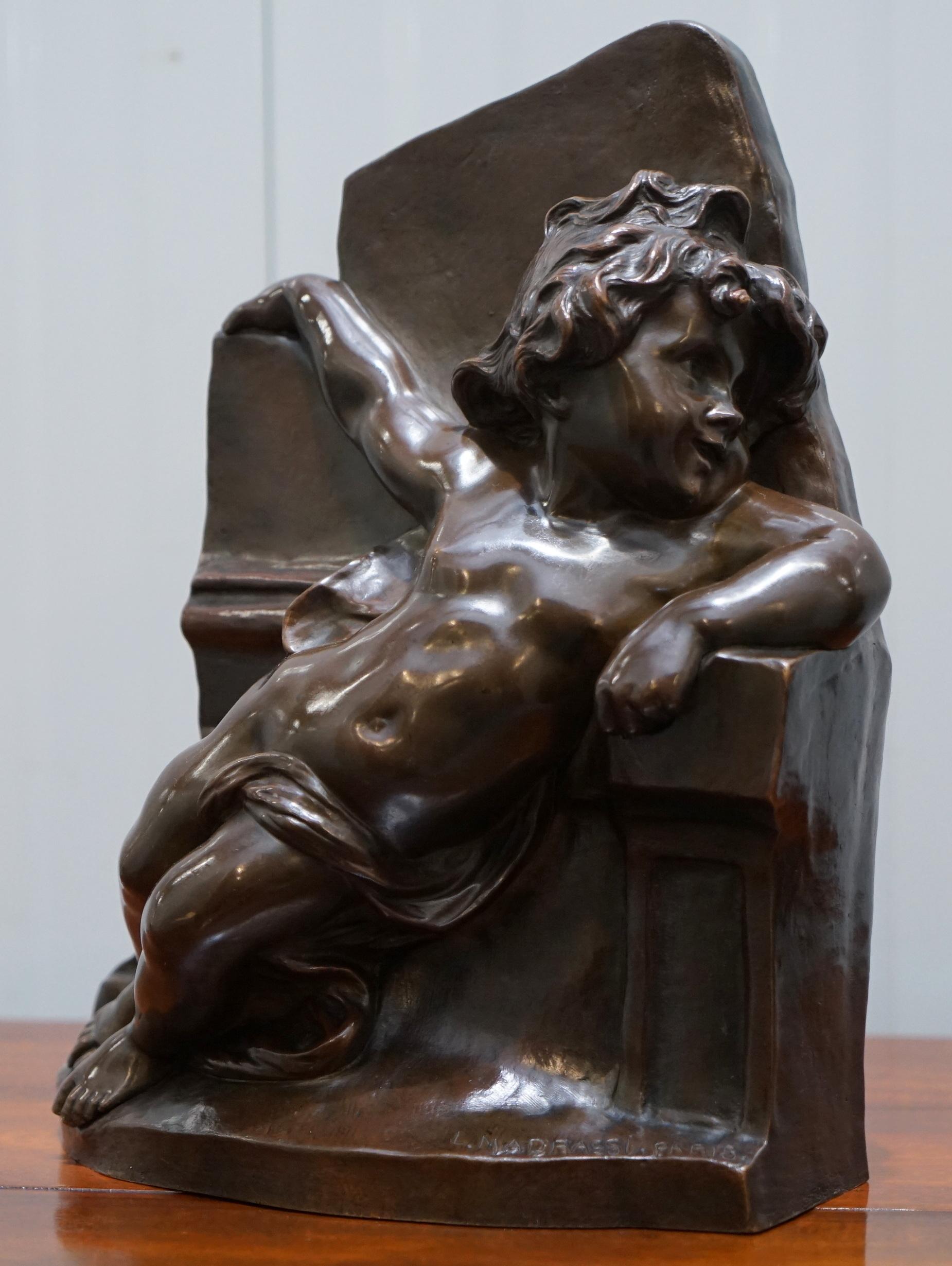 We are delighted to offer for sale this rare Napoleon III era large sized bronze statue of a Little Cherub Angel signed Luca Madrasi (1848-1919)

A very decorative and good sized piece, its rare to find a Cherub with a background setting in
