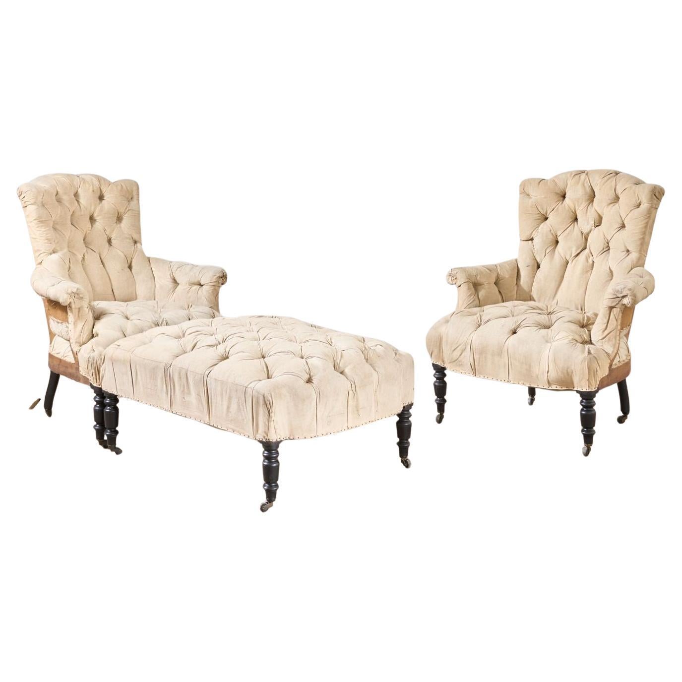 Rare Napoleon III pair of Buttoned back and seat armchairs with matching stool For Sale