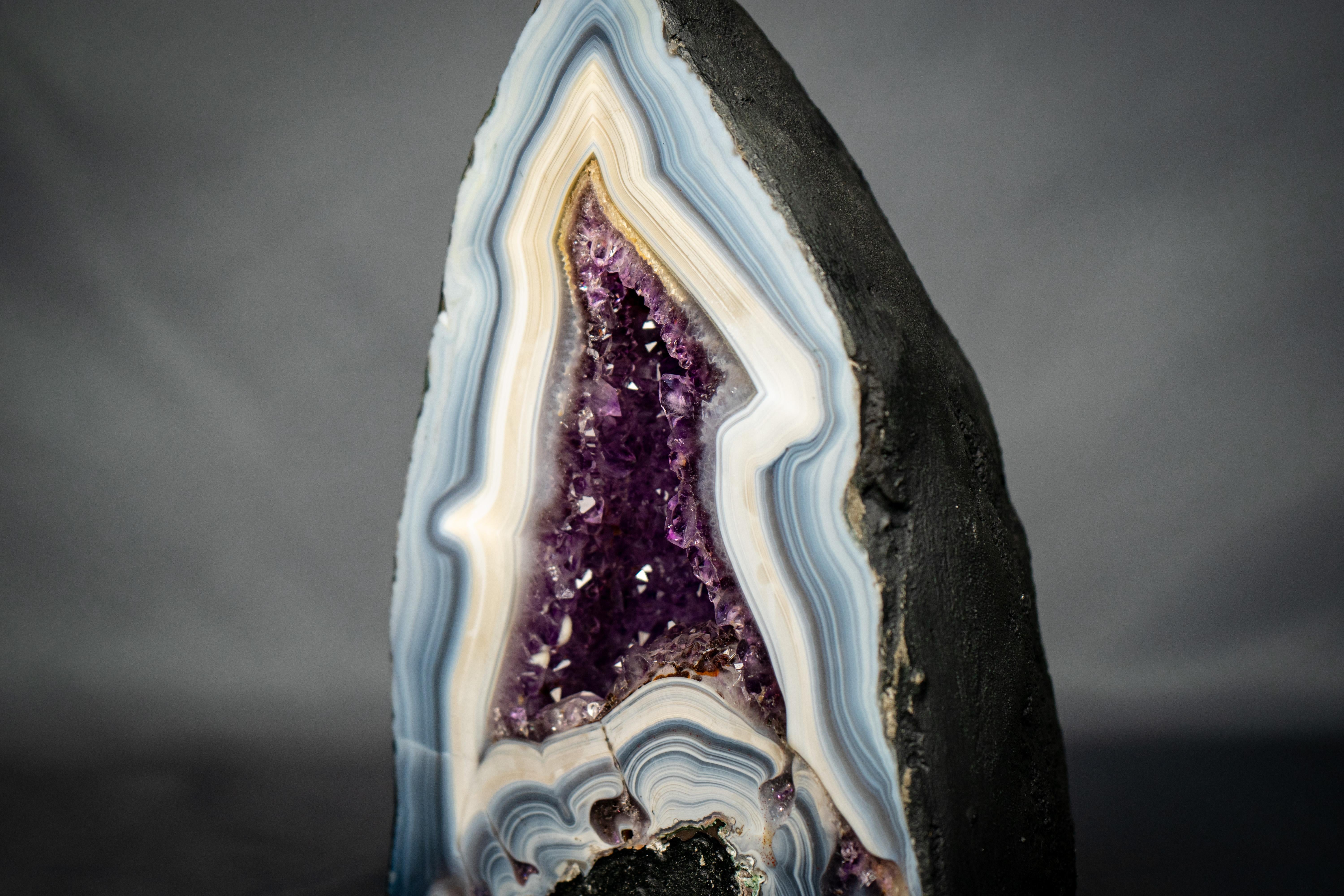 Collector's Blue Lace Agate Geode: A Harmonious Agate with Rare Formation, Bold White and Blue Laces

▫️ Description

An artwork crafted by nature; this rare Agate Geode has beautifully taken the shape of a flame with its bold laces telling a story