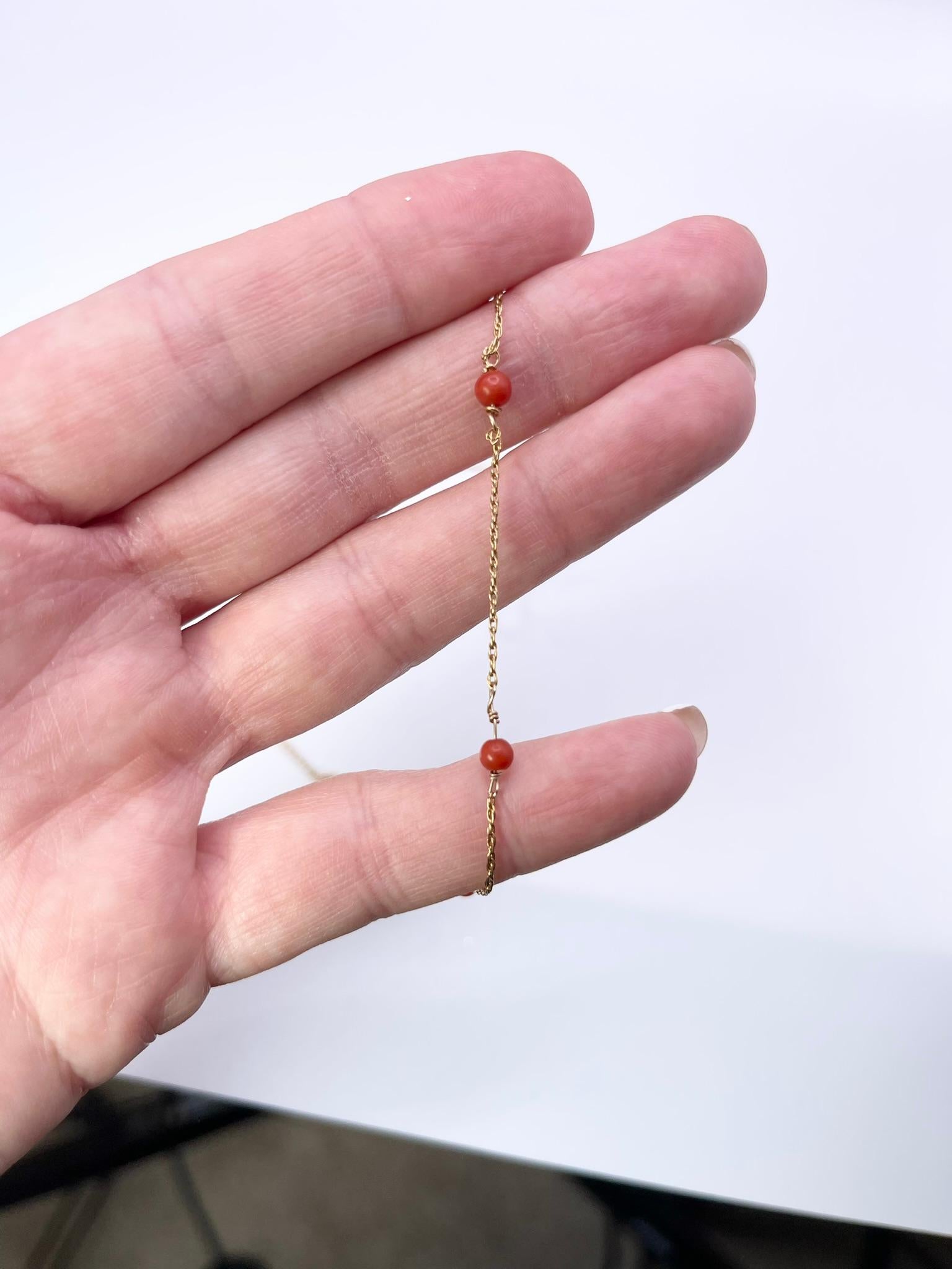 Rare natural undyed coral beads made in 14KT yellow gold yard necklace. The coral beads touch the skin and many cultures it is believed that coral has tremendous power when it touches the skin of a person! Stunning red necklace ready to ship! Comes