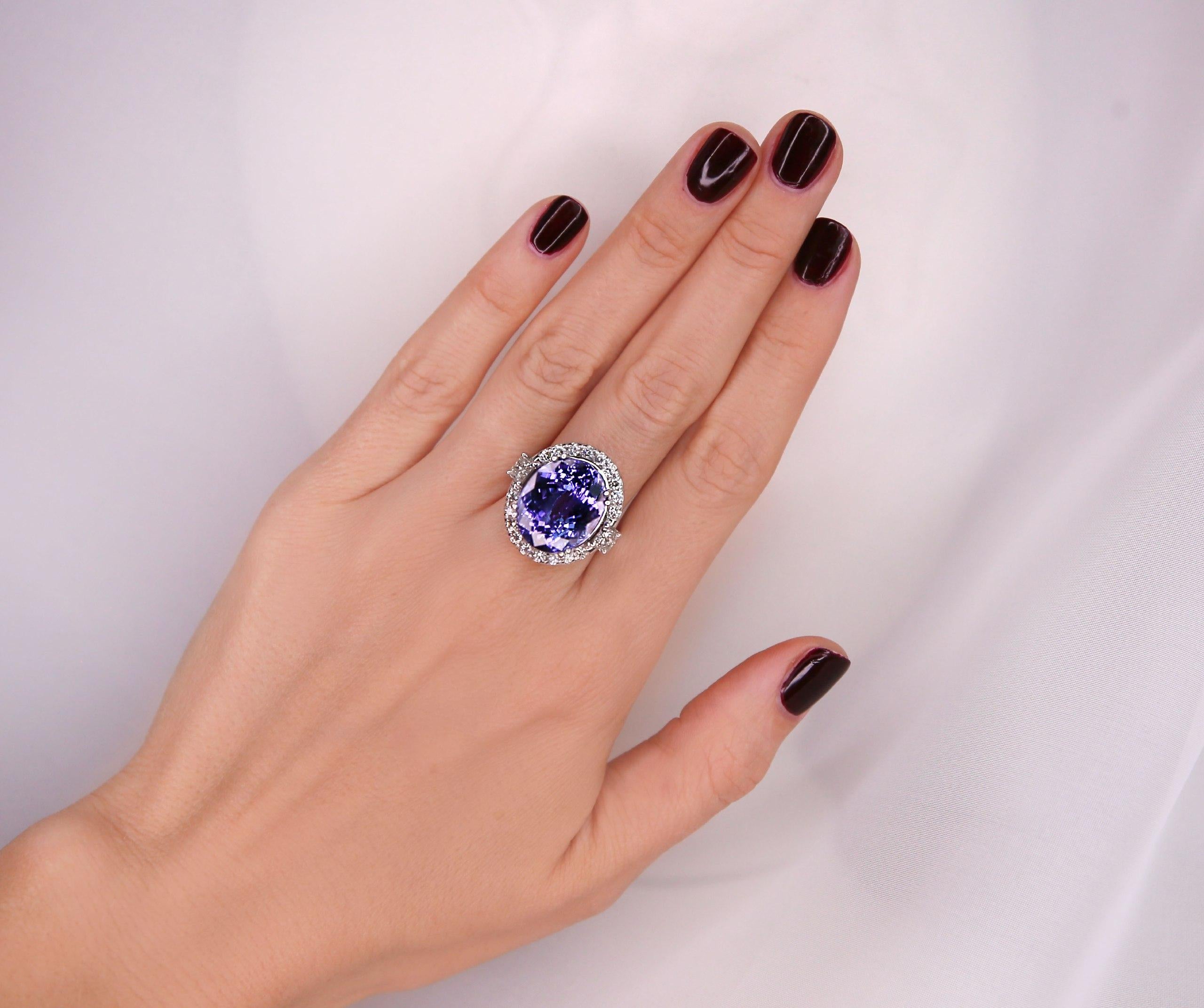 18K Solid White Gold Diamond Ring
Mainstone: Natural
Tanzanite 21.62 Carat 
Shape: Oval

Dimensions: 18.22x14.83 mm 
Treatment Method: Heat

Diamond
Color: F-G 
Clarity: VS2-SI1 
Weight: 1.30 Carat 

Shape: Round 
Natural 
Not-treated 

Total Metal