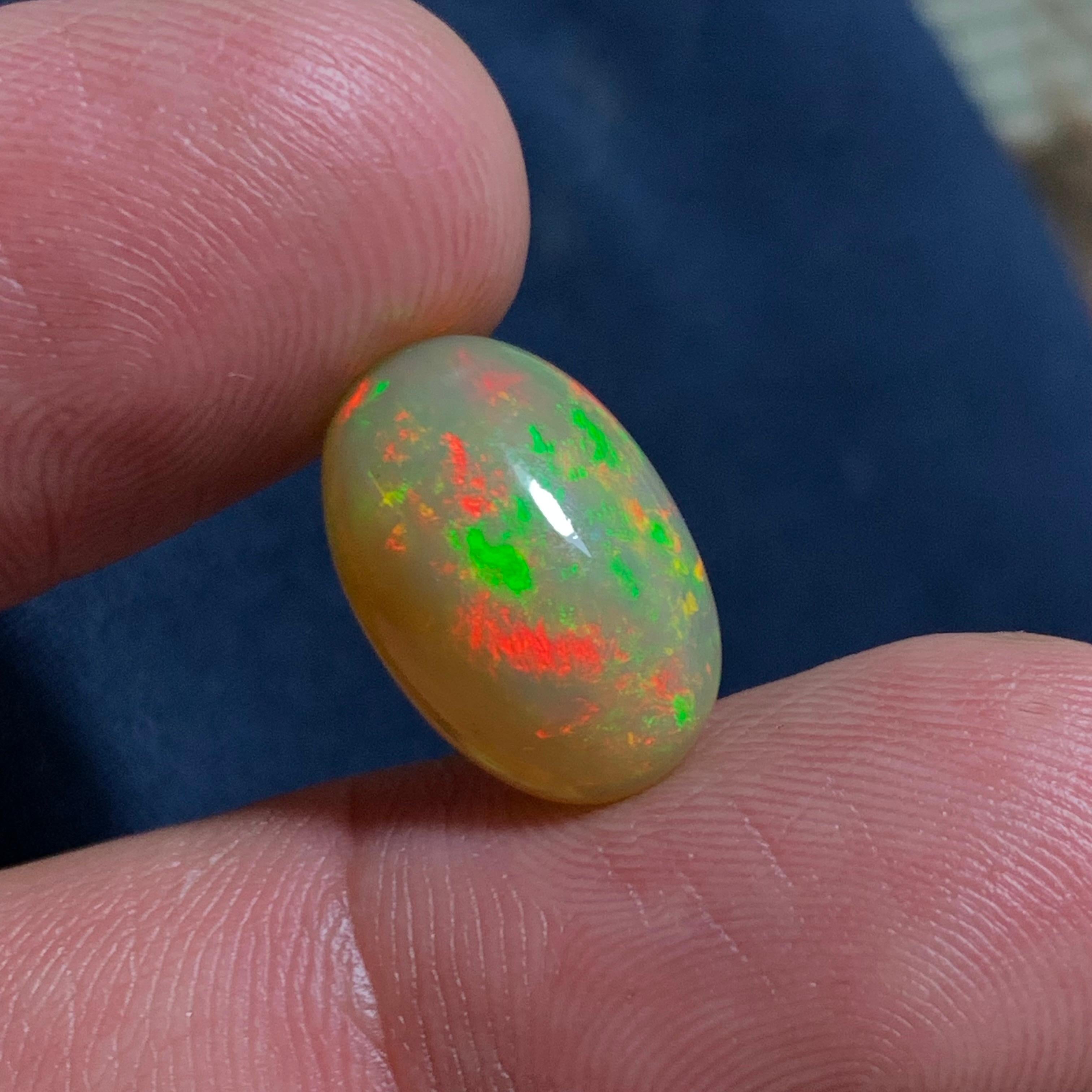 Rare Natural Fire Opal Oval Shape with play of colors, 6 Ct-Ethiopia  1