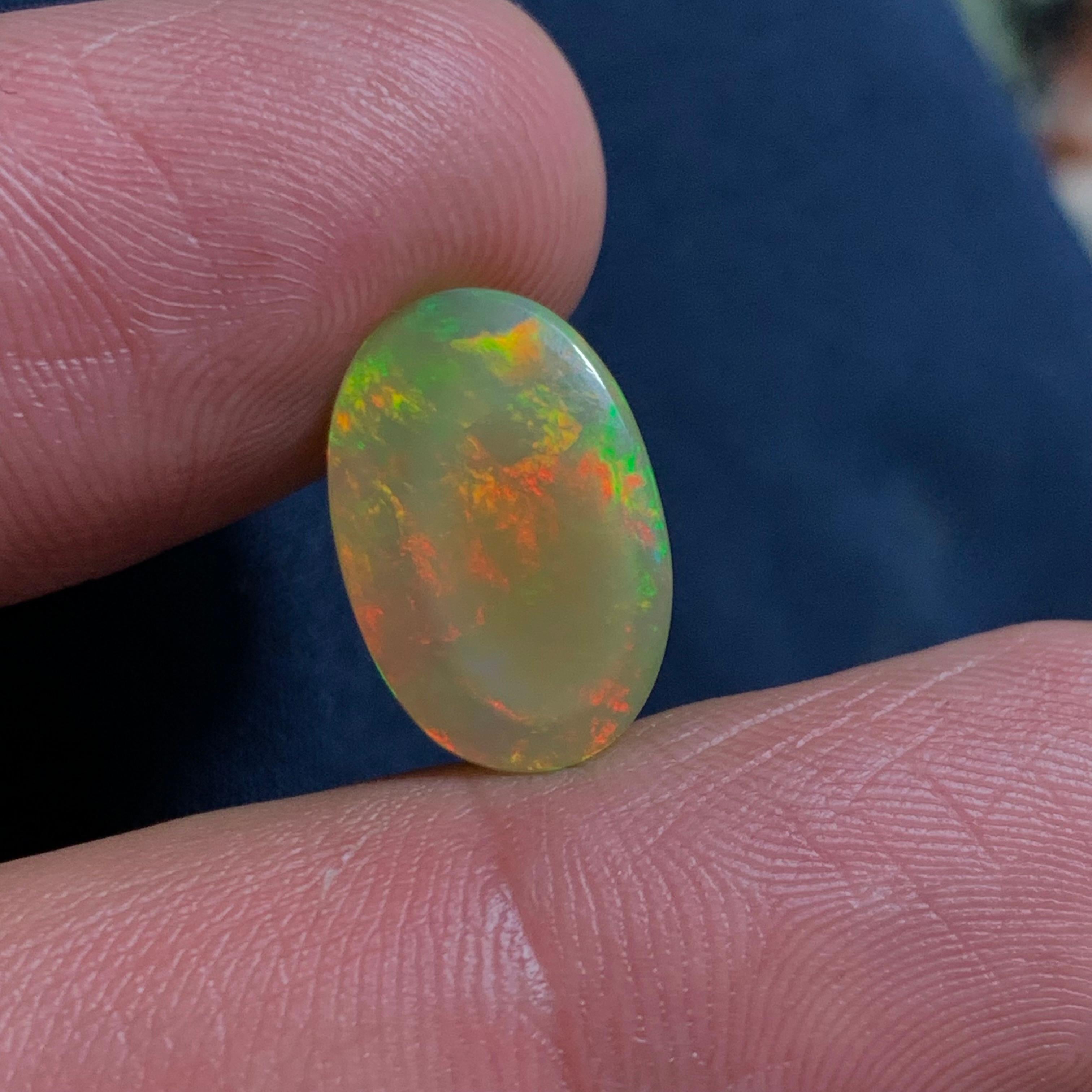 Rare Natural Fire Opal Oval Shape with play of colors, 6 Ct-Ethiopia  2