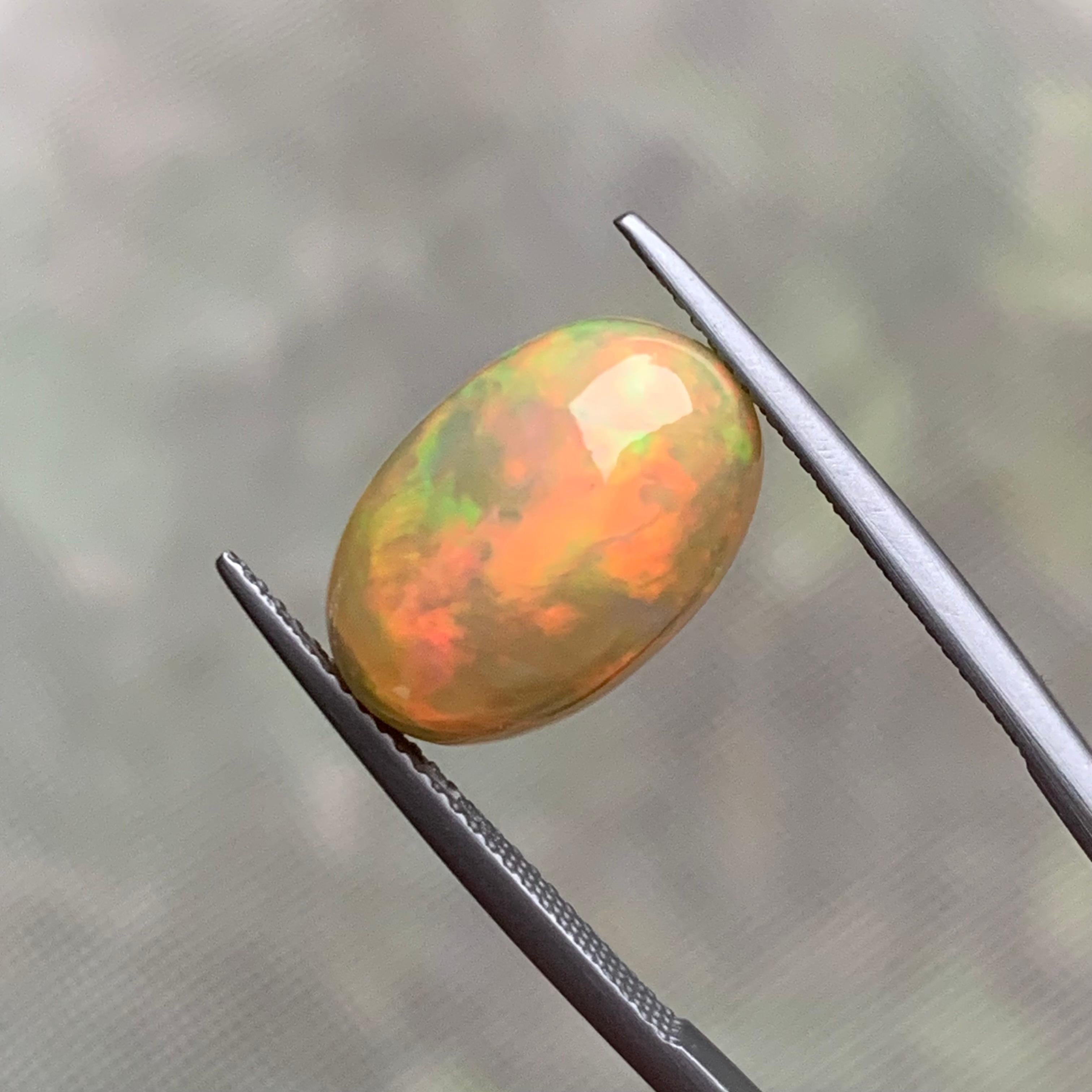 Rare Natural Fire Opal Oval Shape with play of colors, 6 Ct-Ethiopia  7