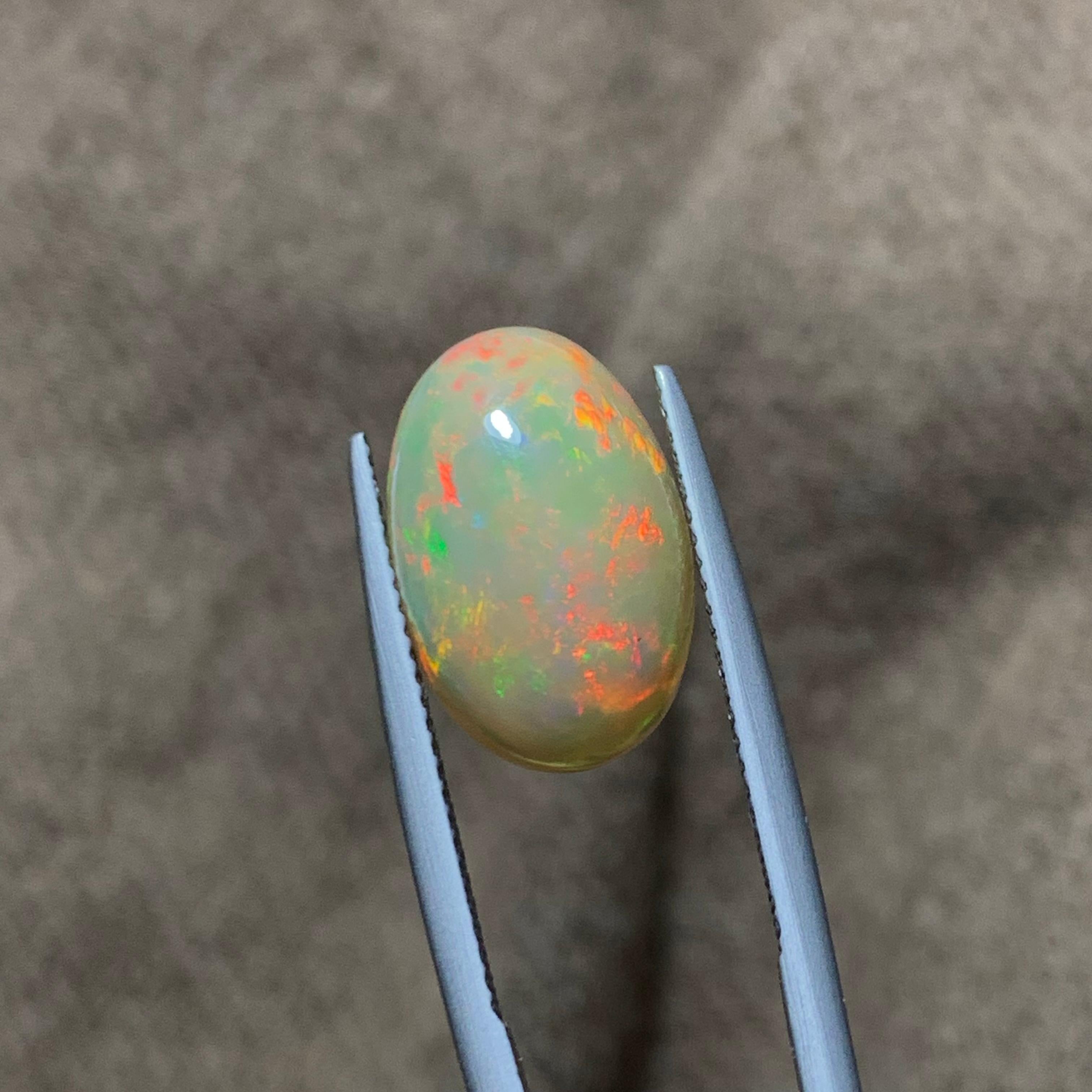 Women's or Men's Rare Natural Fire Opal Oval Shape with play of colors, 6 Ct-Ethiopia 