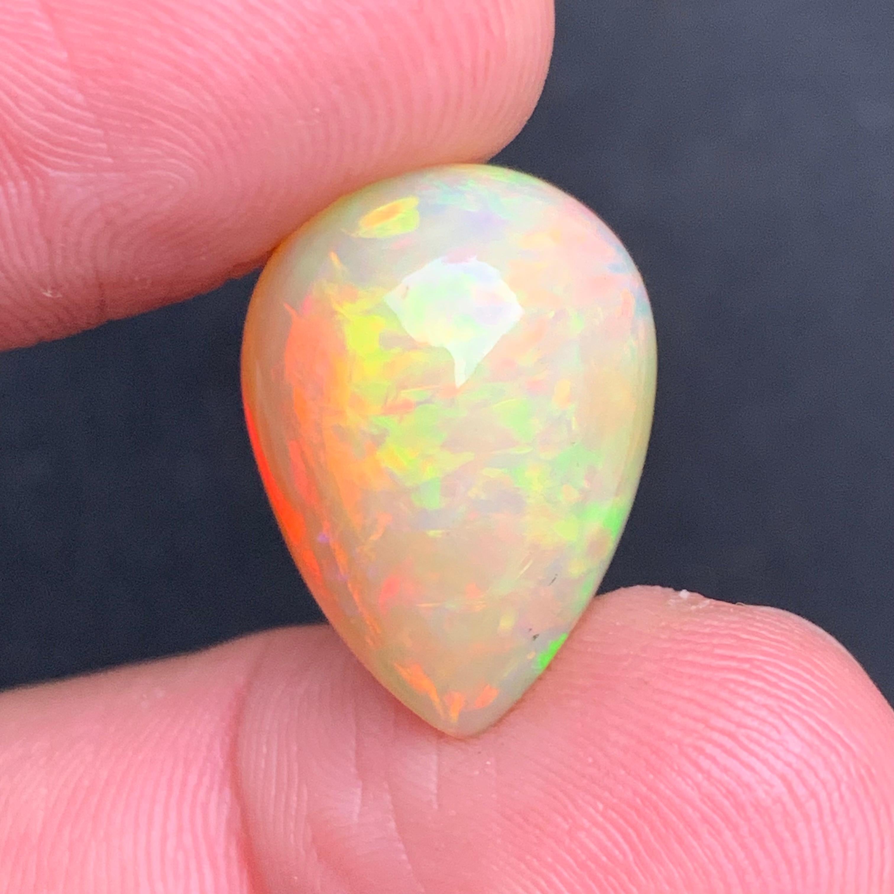 Rare Natural Opal Pear Shape with play of colors full of fire, 10.60Ct-Ethiopia  2