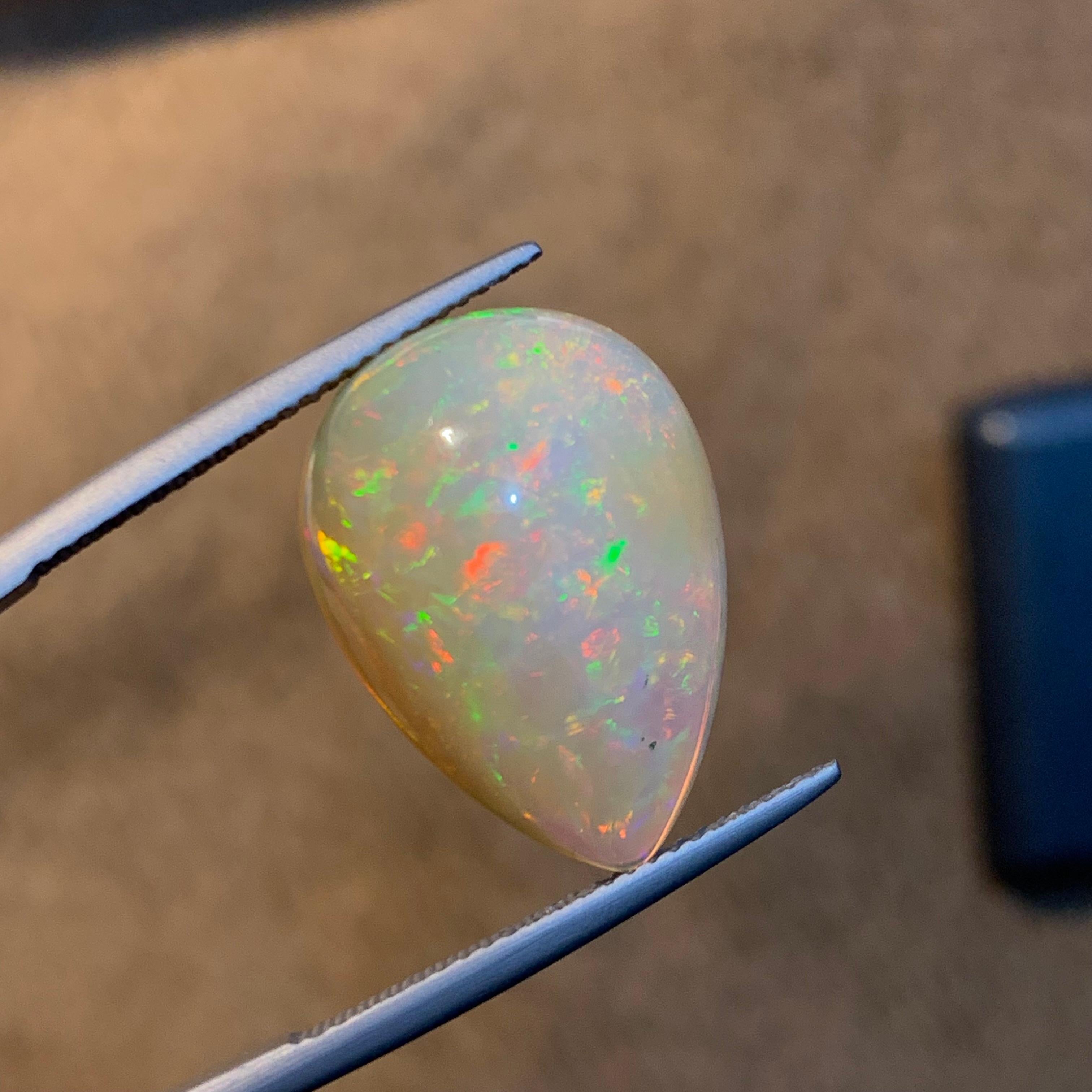 Rare Natural Opal Pear Shape with play of colors full of fire, 10.60Ct-Ethiopia  6