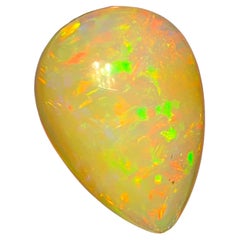 Rare Natural Opal Pear Shape with play of colors full of fire, 10.60Ct-Ethiopia 