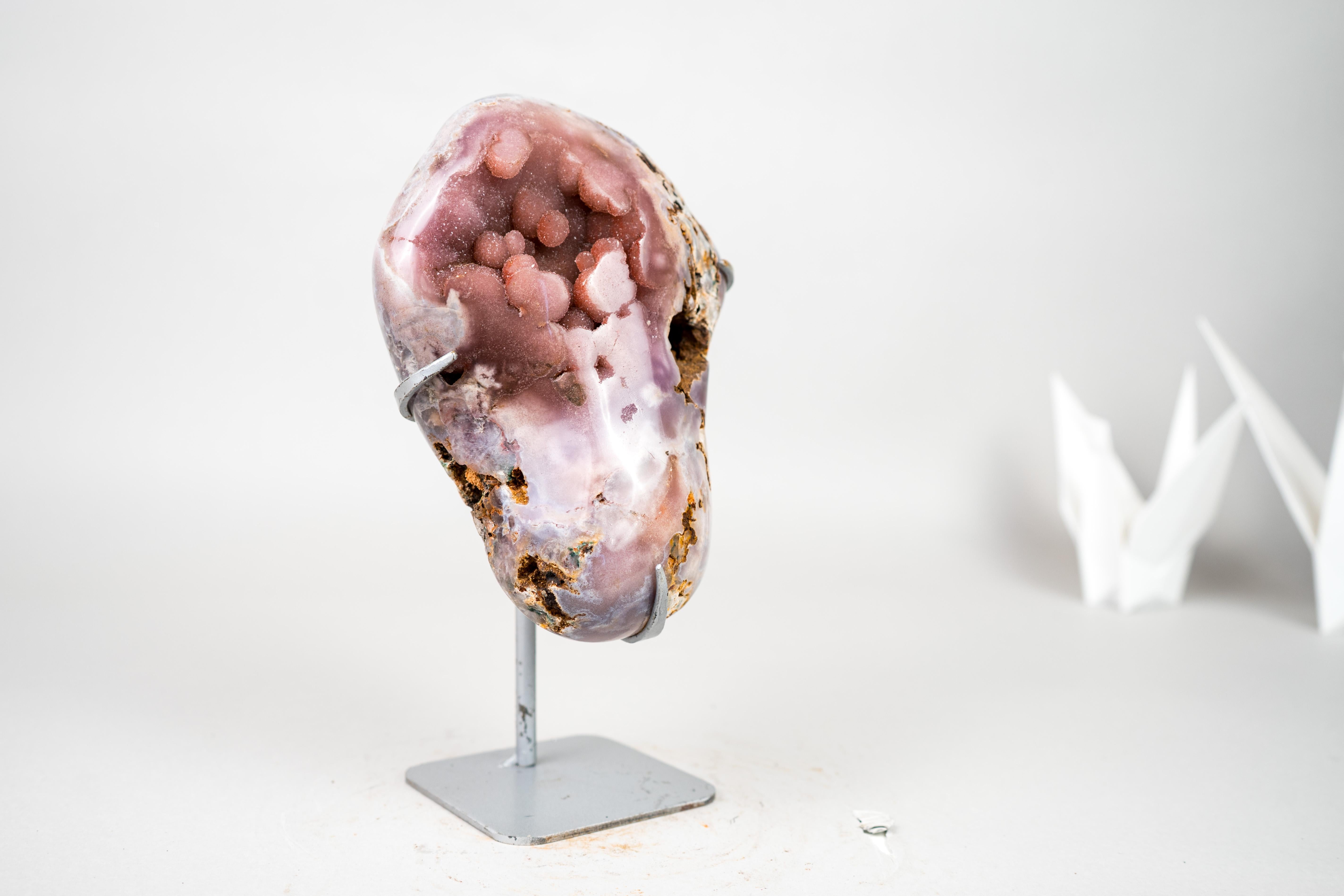Rare Pink Amethyst Geode with Natural Red Amethyst Galaxy Druzy on Stand

▫️ Description

Exceptionally rare, this Pink Amethyst features a unique form of Galaxy Amethyst Druzy that creates a mesmerizing, vibrant effect. This one-of-a-kind natural