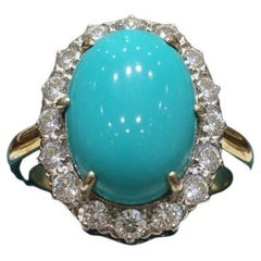 Raro Anillo de Oro Amarillo de 18 Kt y Platino con Cabujón de Turquesa Natural y Diamante
